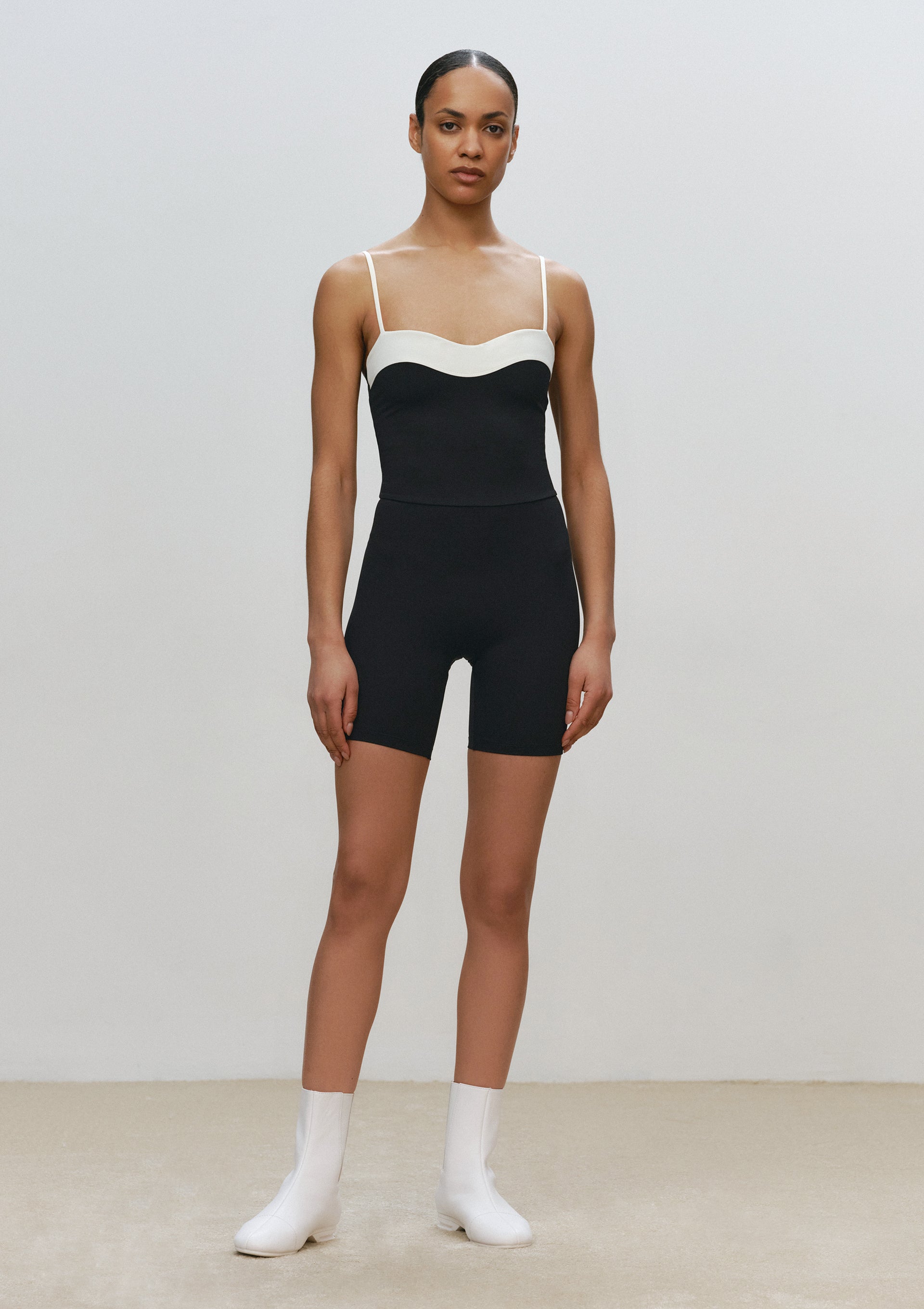 Curve Jumpsuit in Black-Ivory