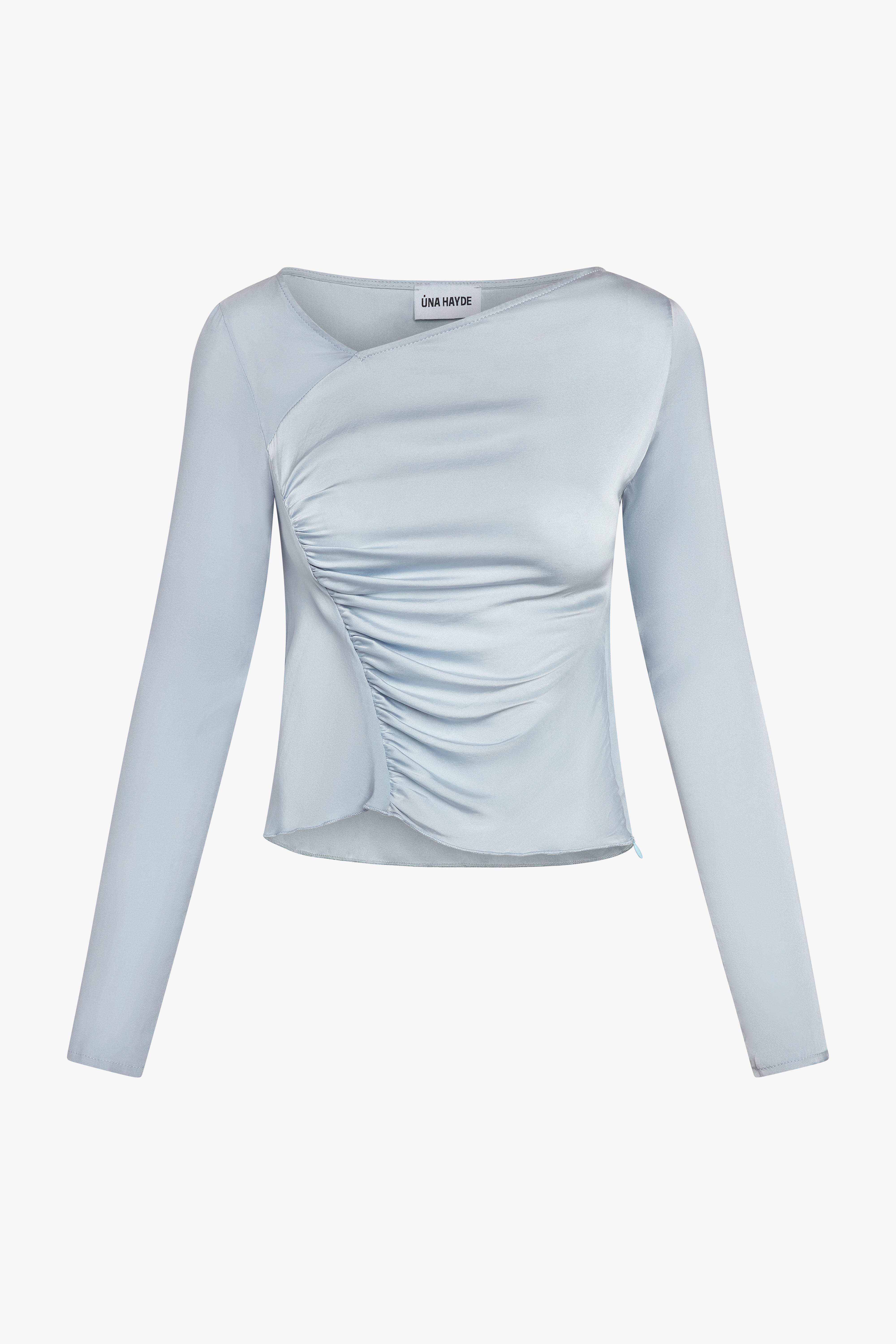 A blue sustainable long sleeve top with an asymmetric neckline and a subtle two-tone gathered bodice.