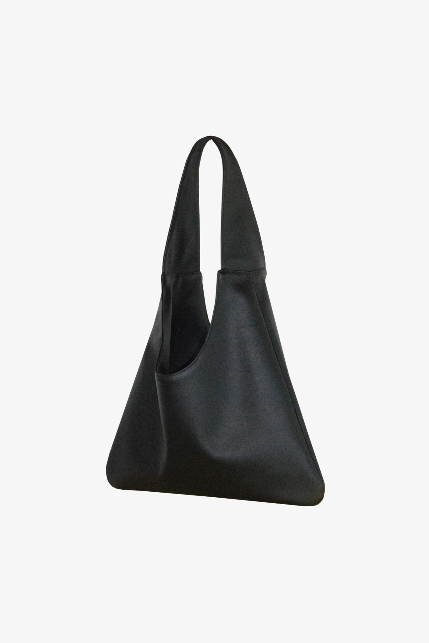 Black sustainable shoulder bag made from cactus leather on a white background. 3/4 view.