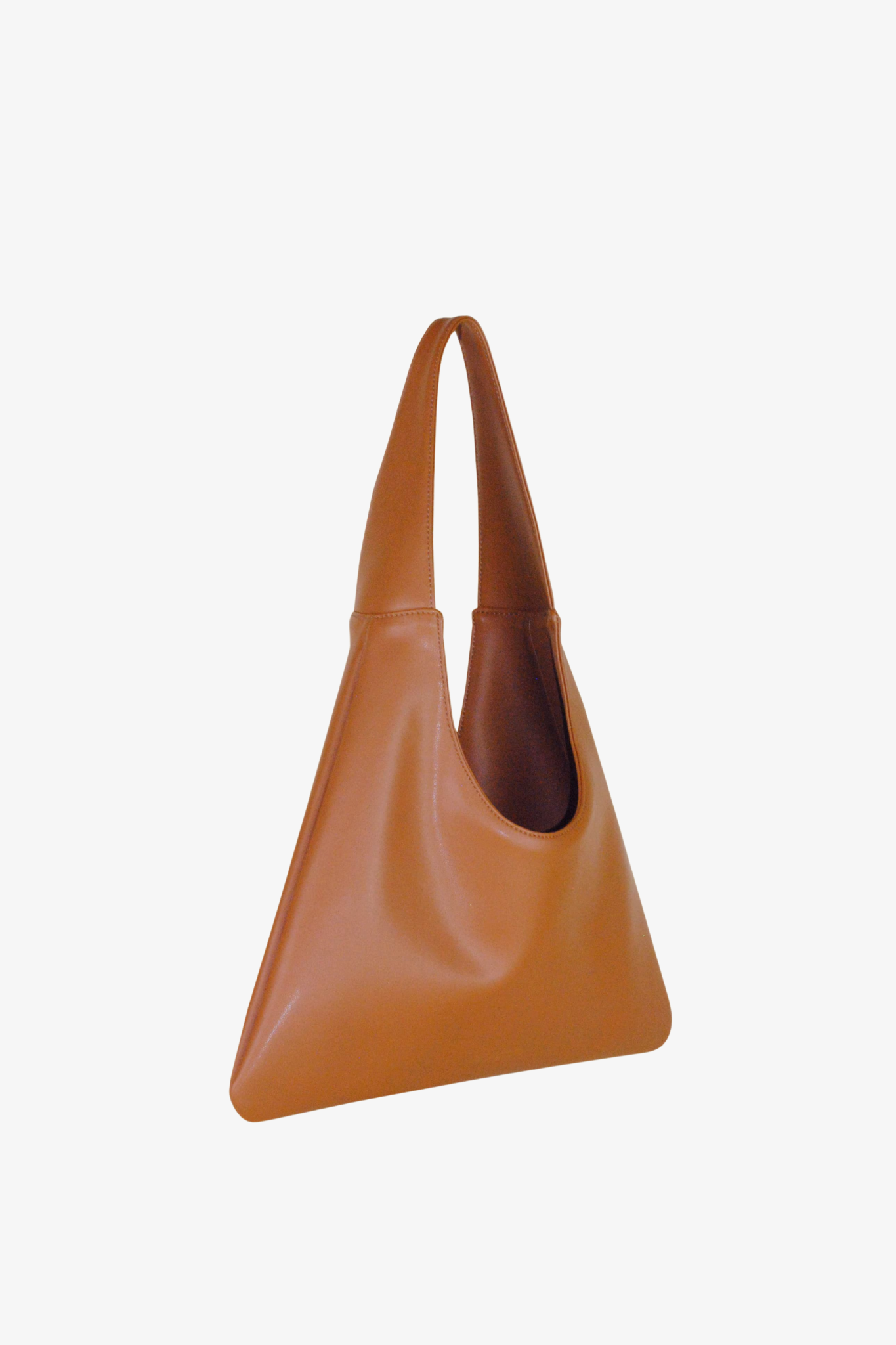 Brown leather handbag made from cactus leather on a white background
