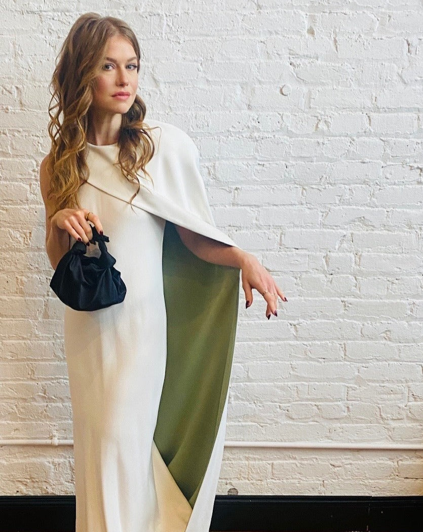 A model wearing the black silk knot bag. Deadstock silky satin fabric sourced in Los Angeles.