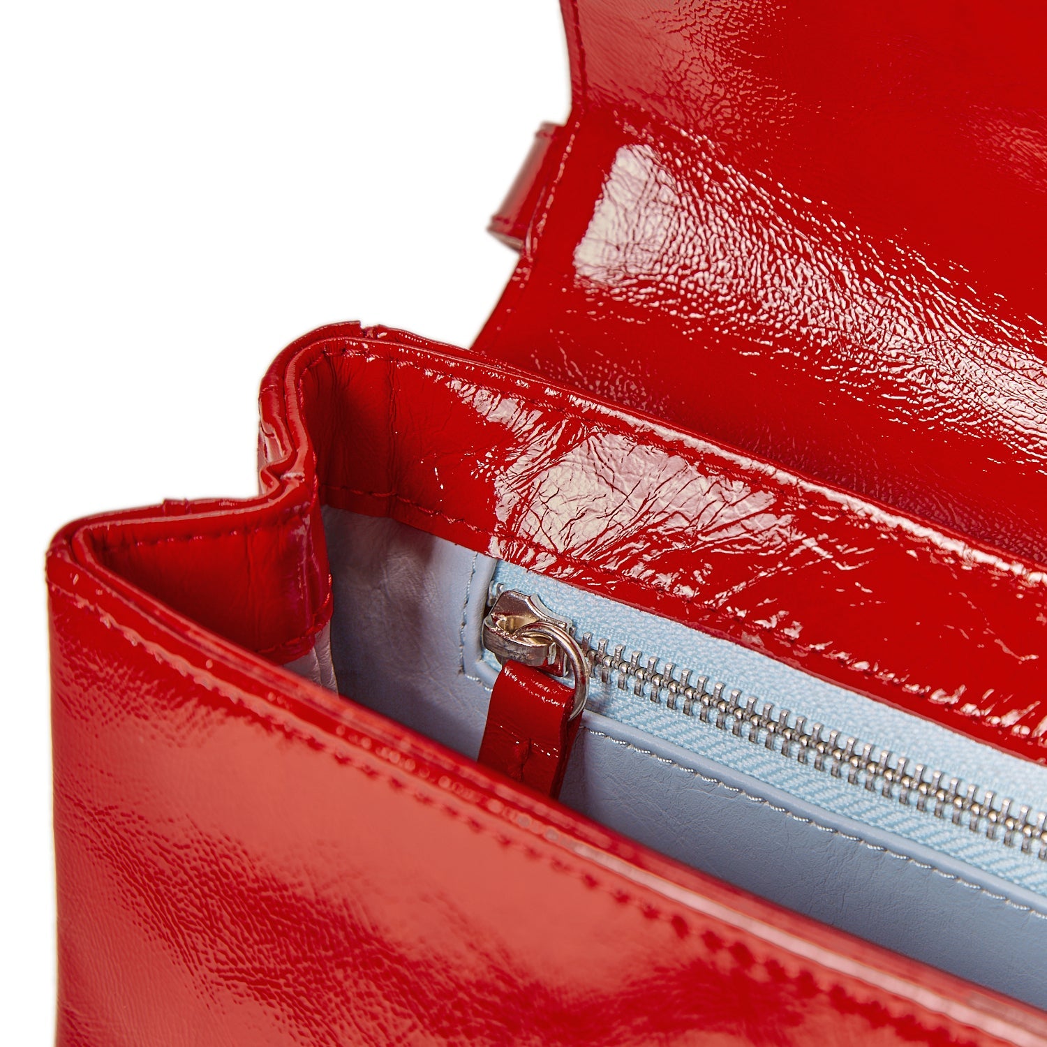 Close-up of the babe red bag in a white background. 100% made from deadstock leather.