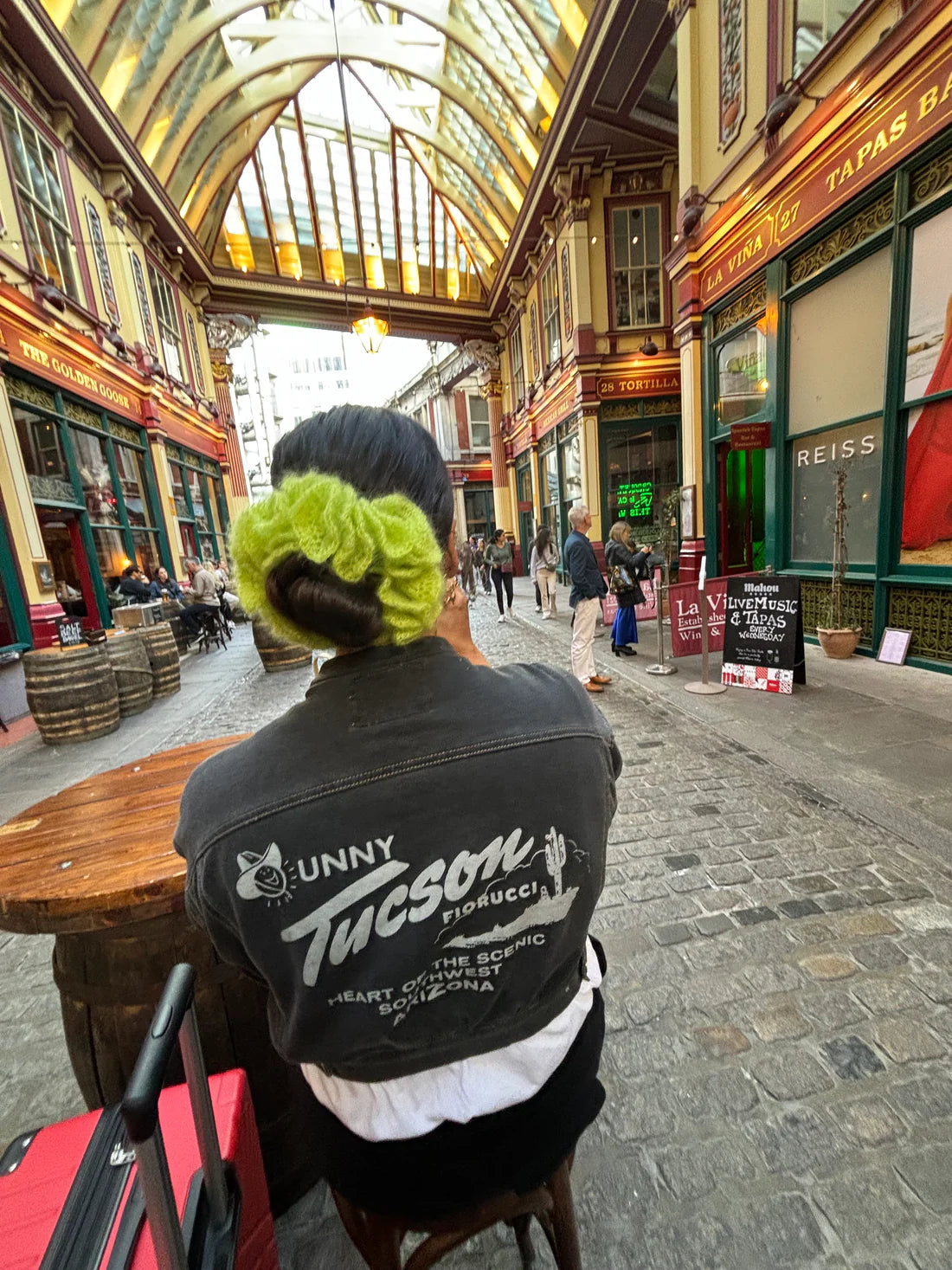 A model wearing the bonnie scrunchie in an aesthetically background. Handmade in London!