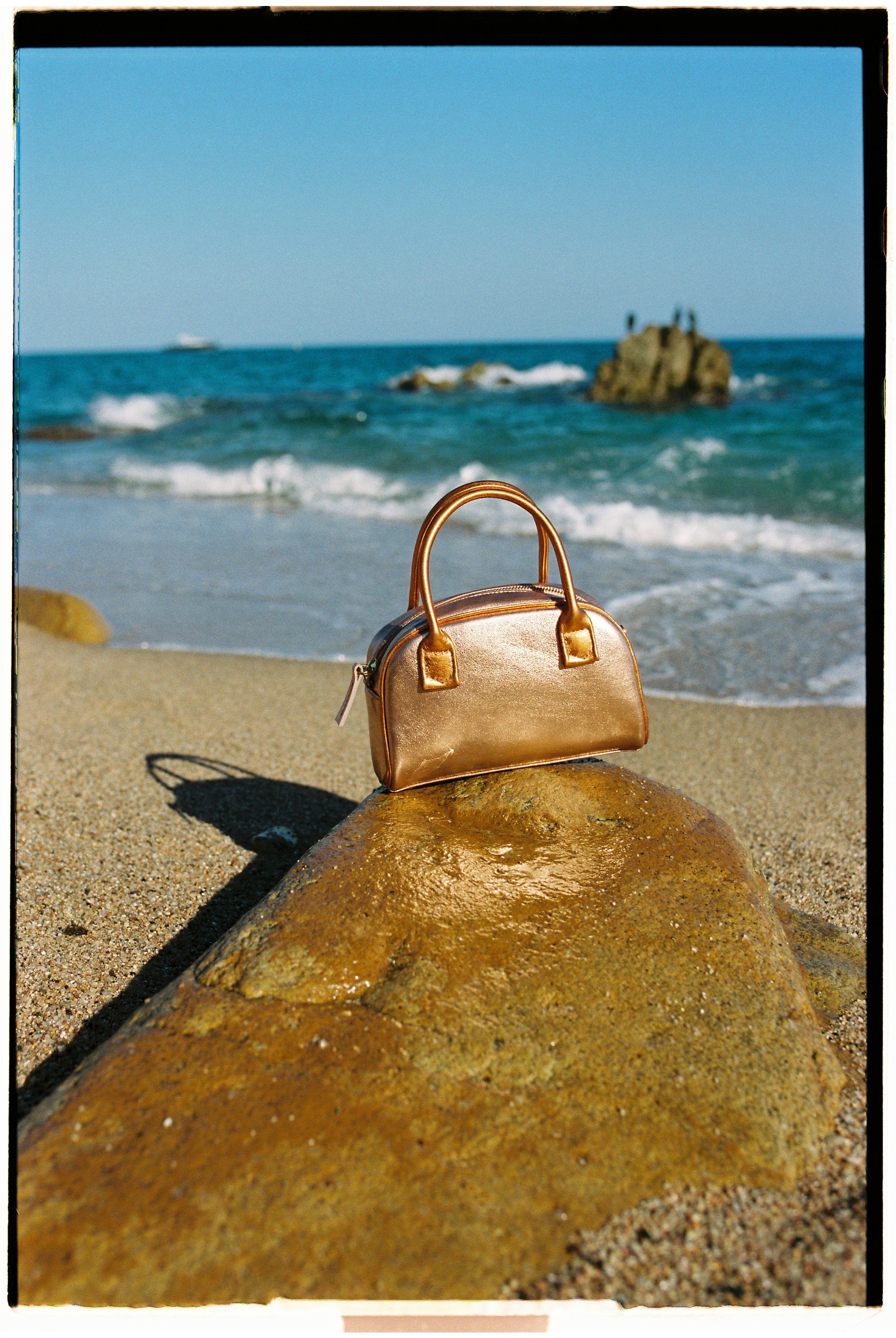 The bowling tropico bag in an aesthetically background. 100% made from deadstock leather.