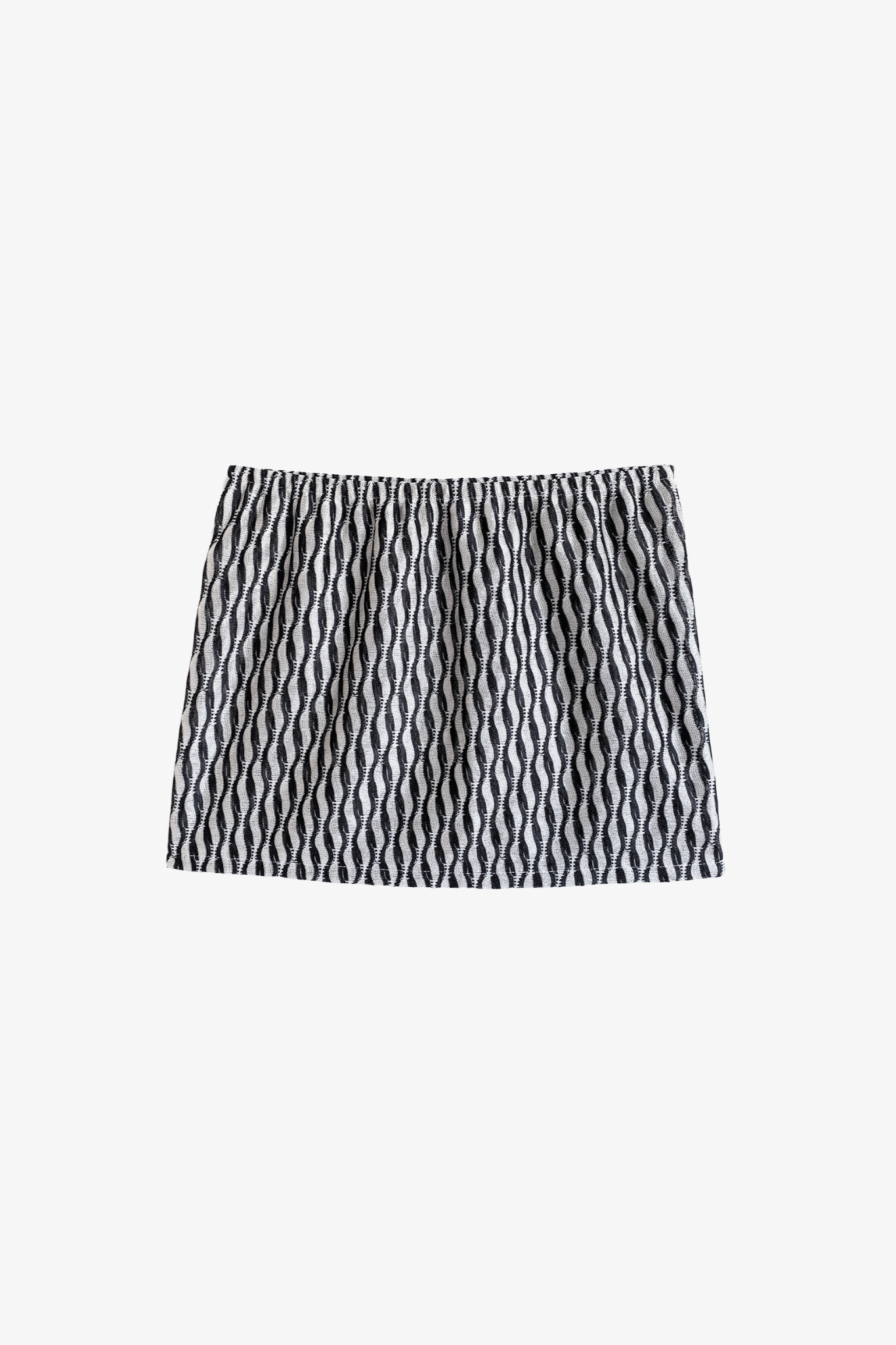 The electra mini skirt in a white background. 100% deadstock Missoni-like fabric.