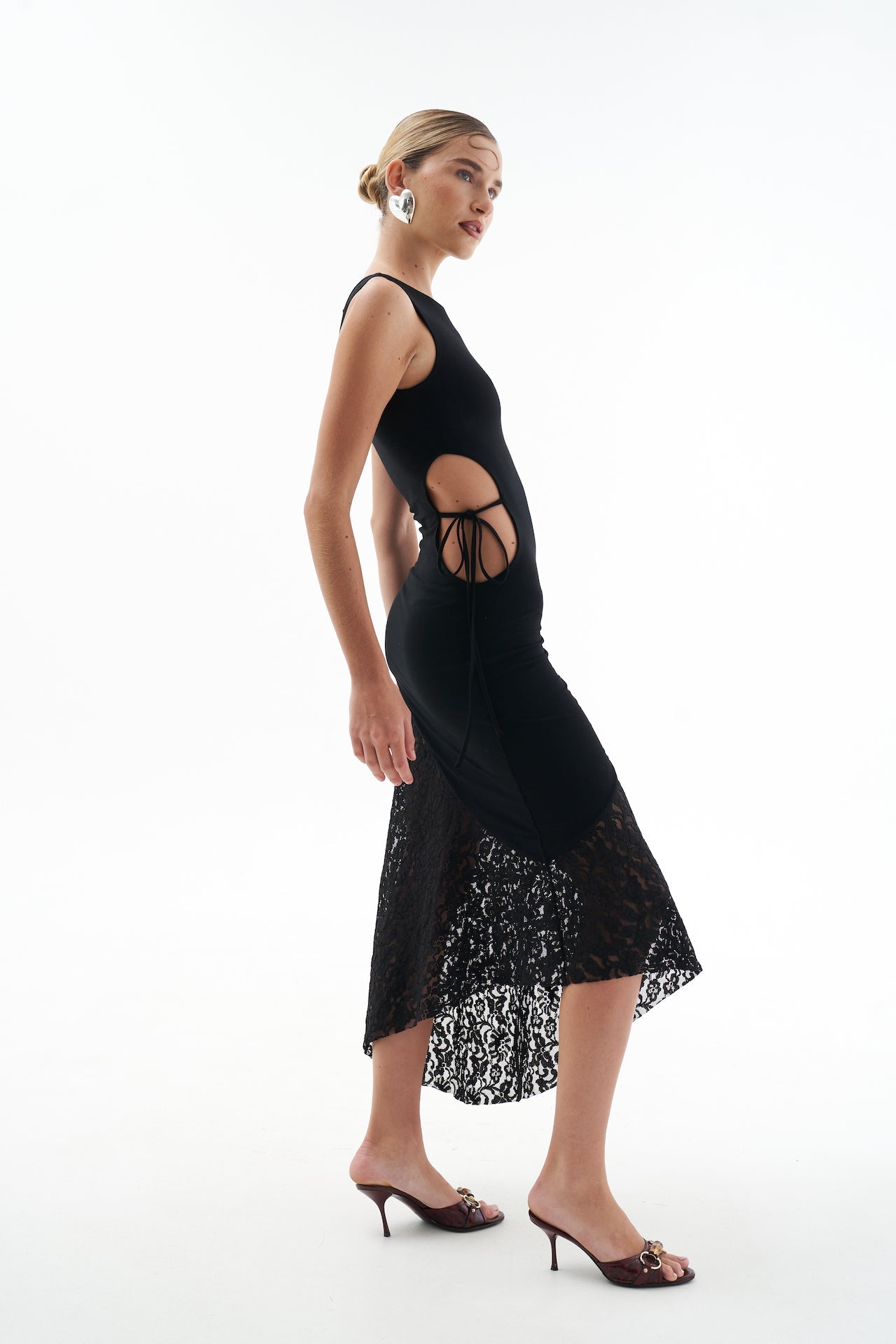 A model wearing the eve dress in a white background. 100% made from sustainable materials.