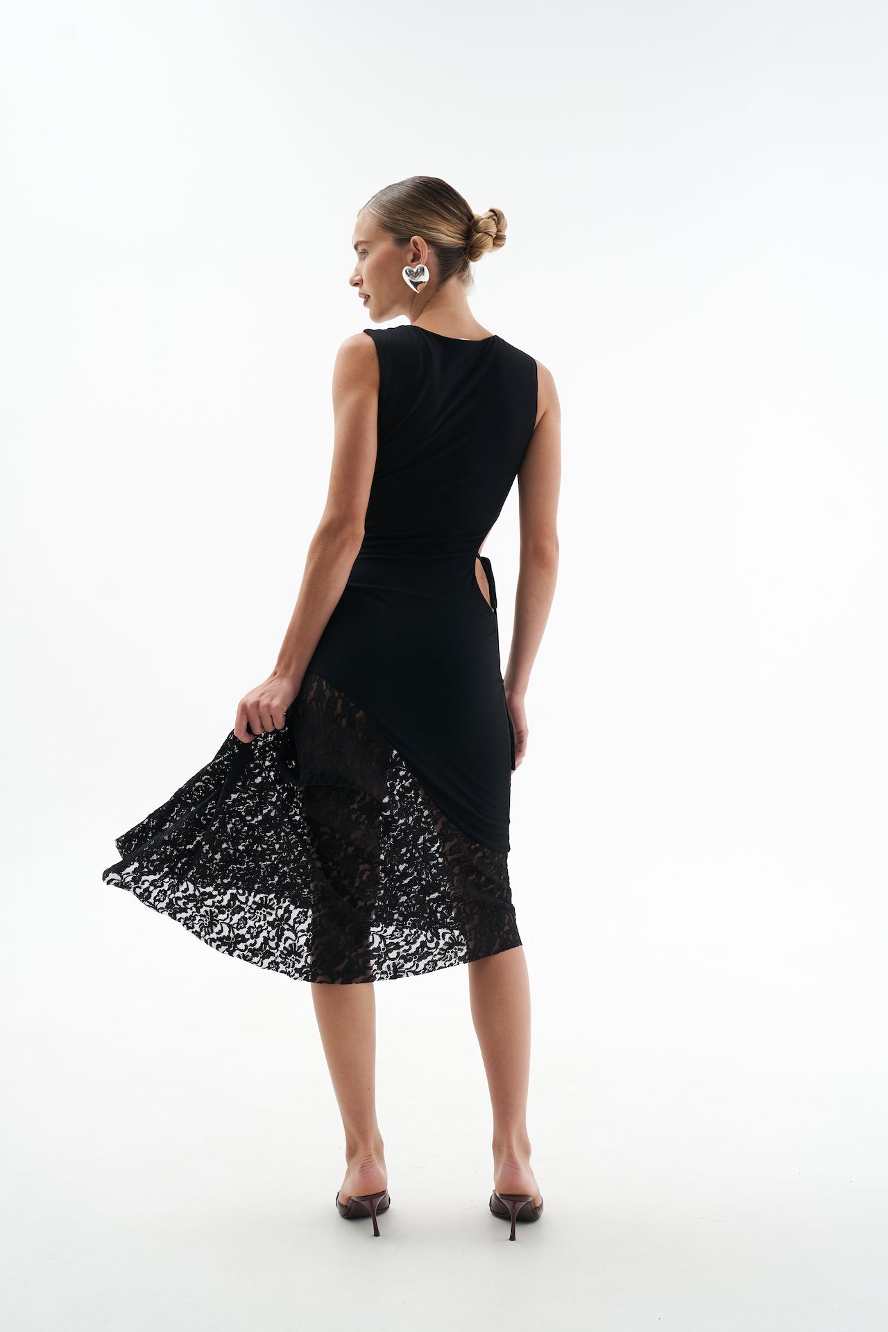 A model wearing the eve dress in a white background. 100% made from sustainable materials.