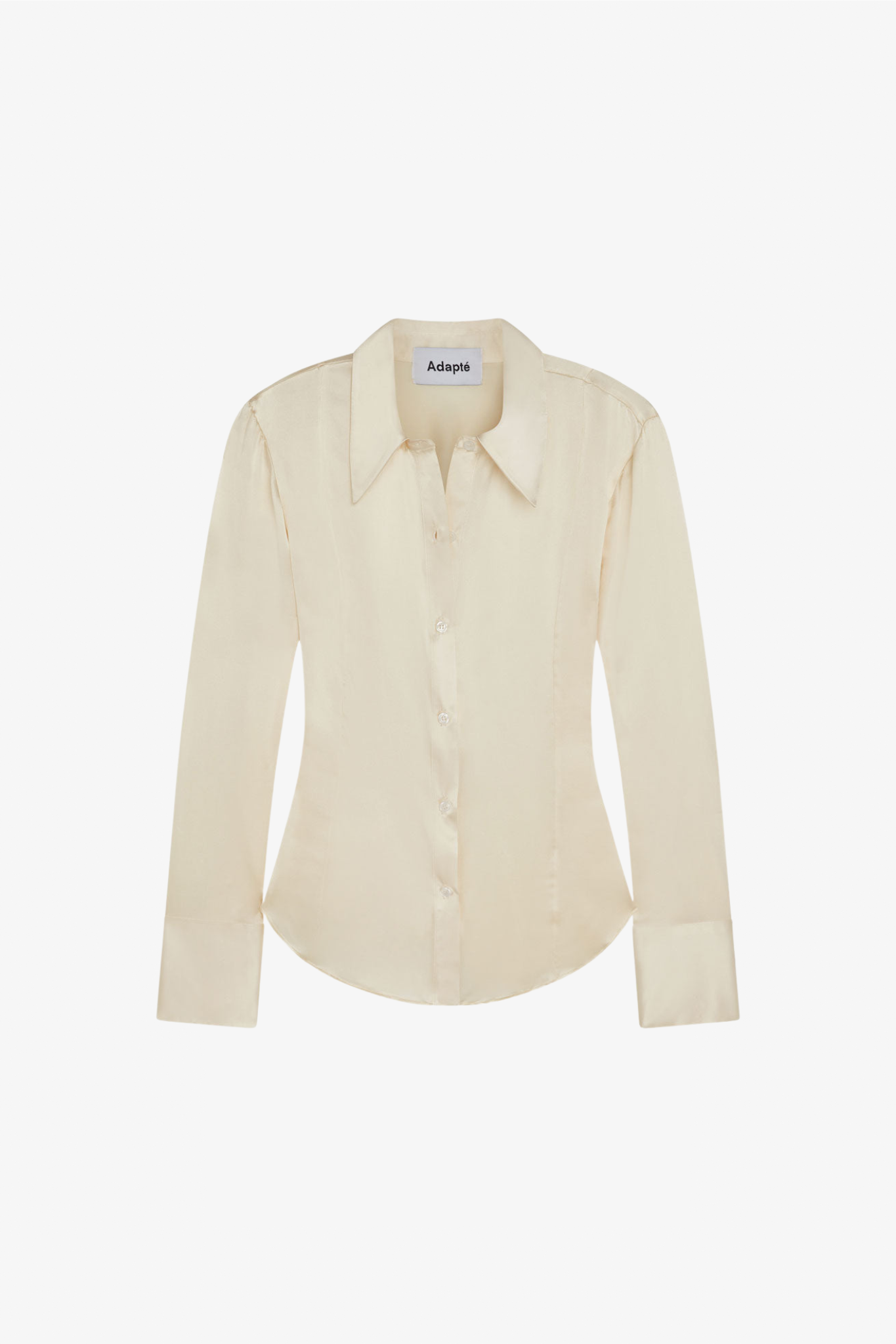 A silk butter long sleeve button up blouse in a white background. Made from sustainable materials.