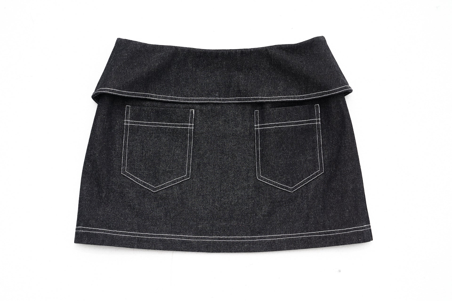 The Jackie Skirt in a white background. 100% made from sustainable materials.