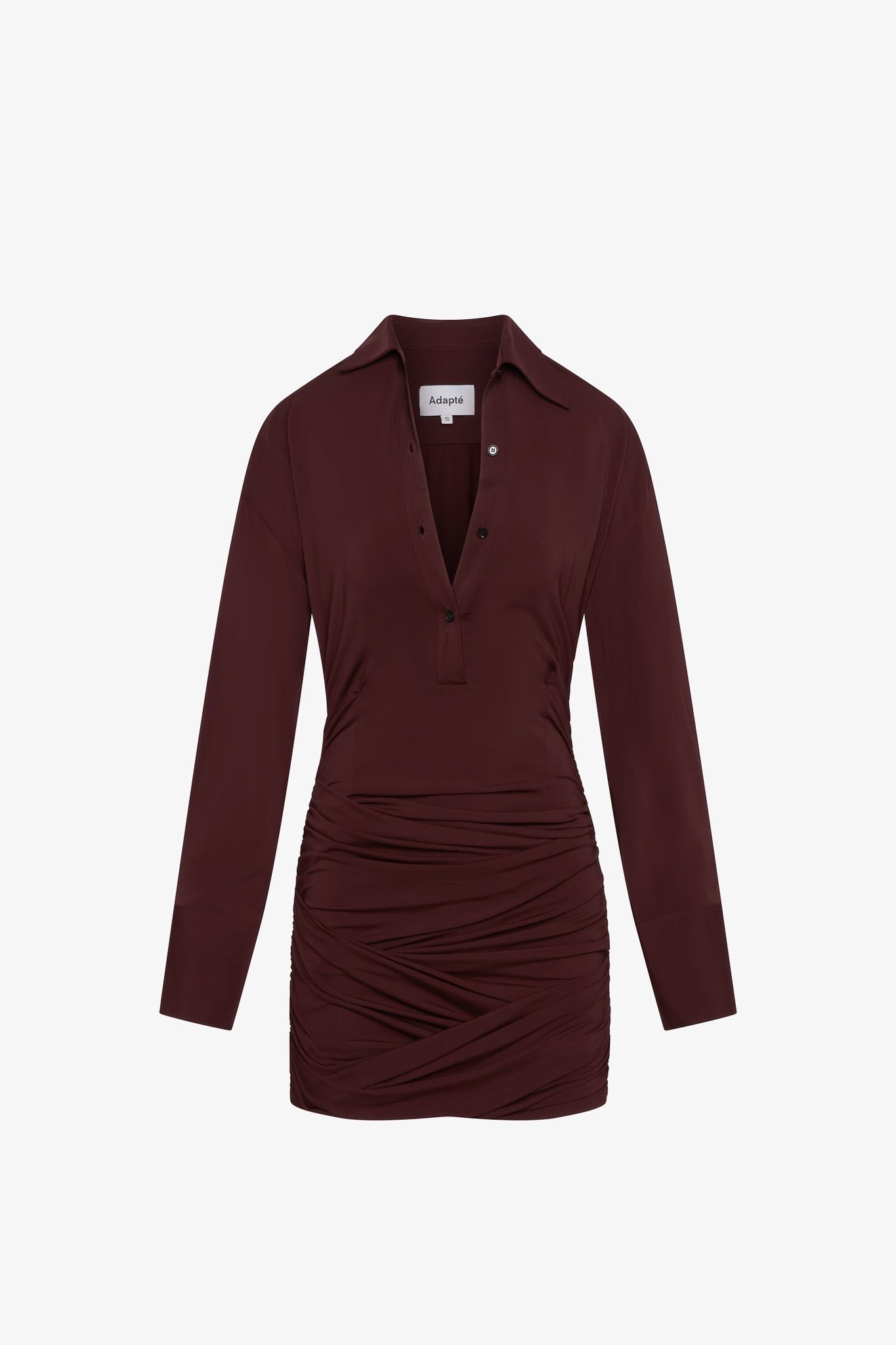 A burgundy, mini-length long sleeve dress with buttons and collar in a white background. Made from sustainable deadstock materials.