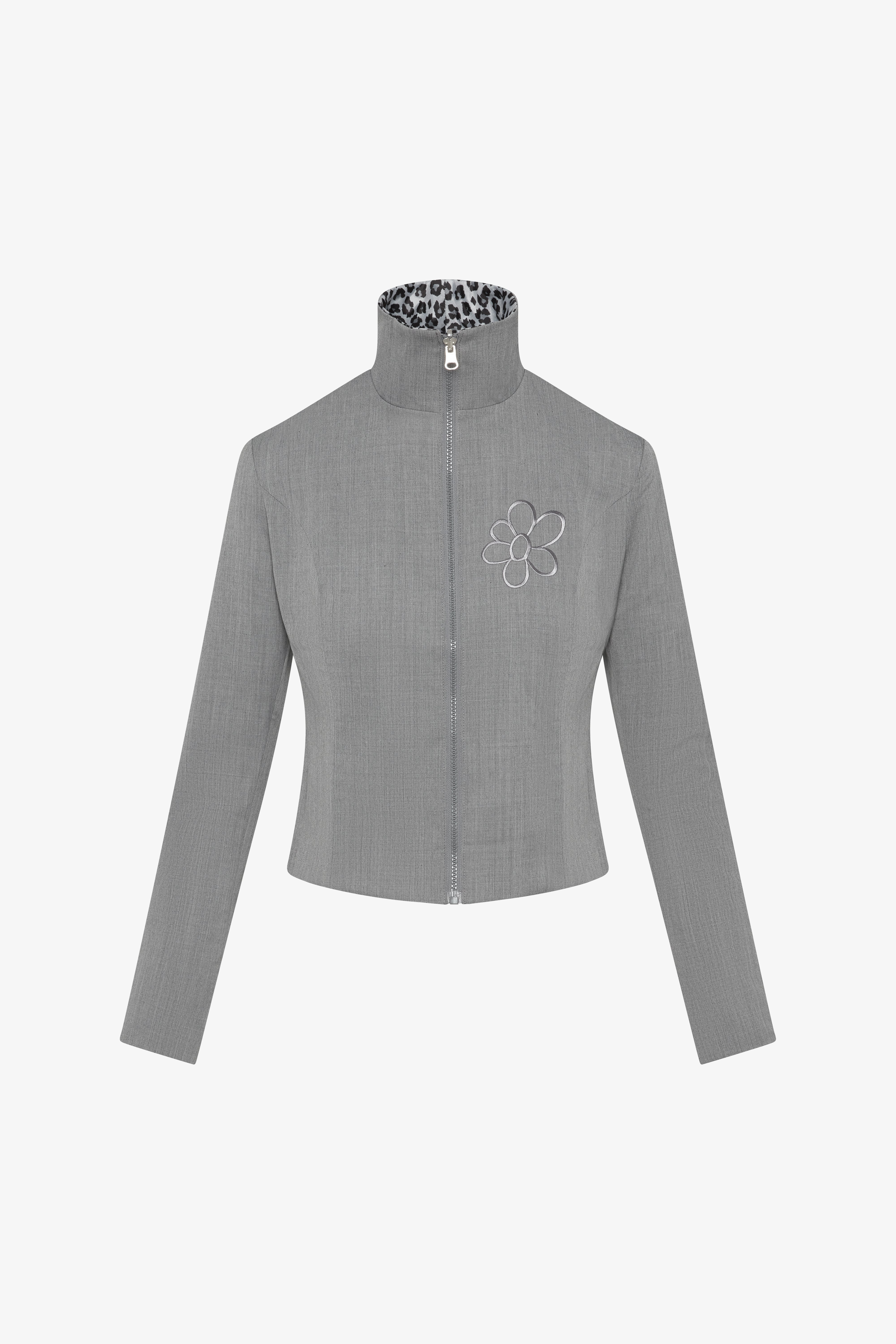 The Kaia Jacket in a white background. 100% made from sustainable deadstock material.