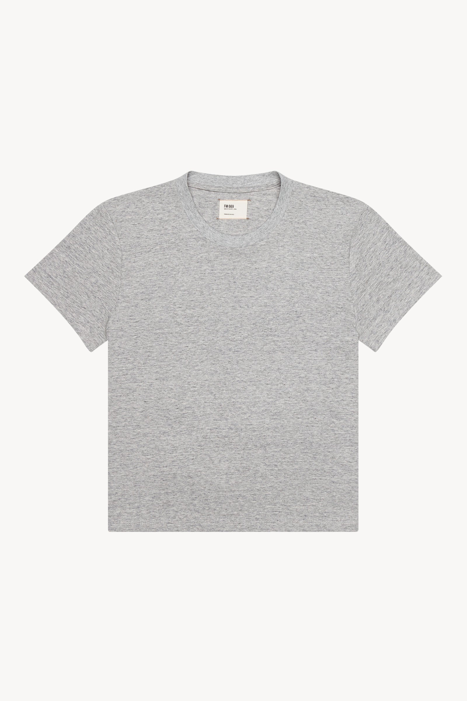 The gray heather little tshirt in a white background. 100% made from organic grown cotton.
