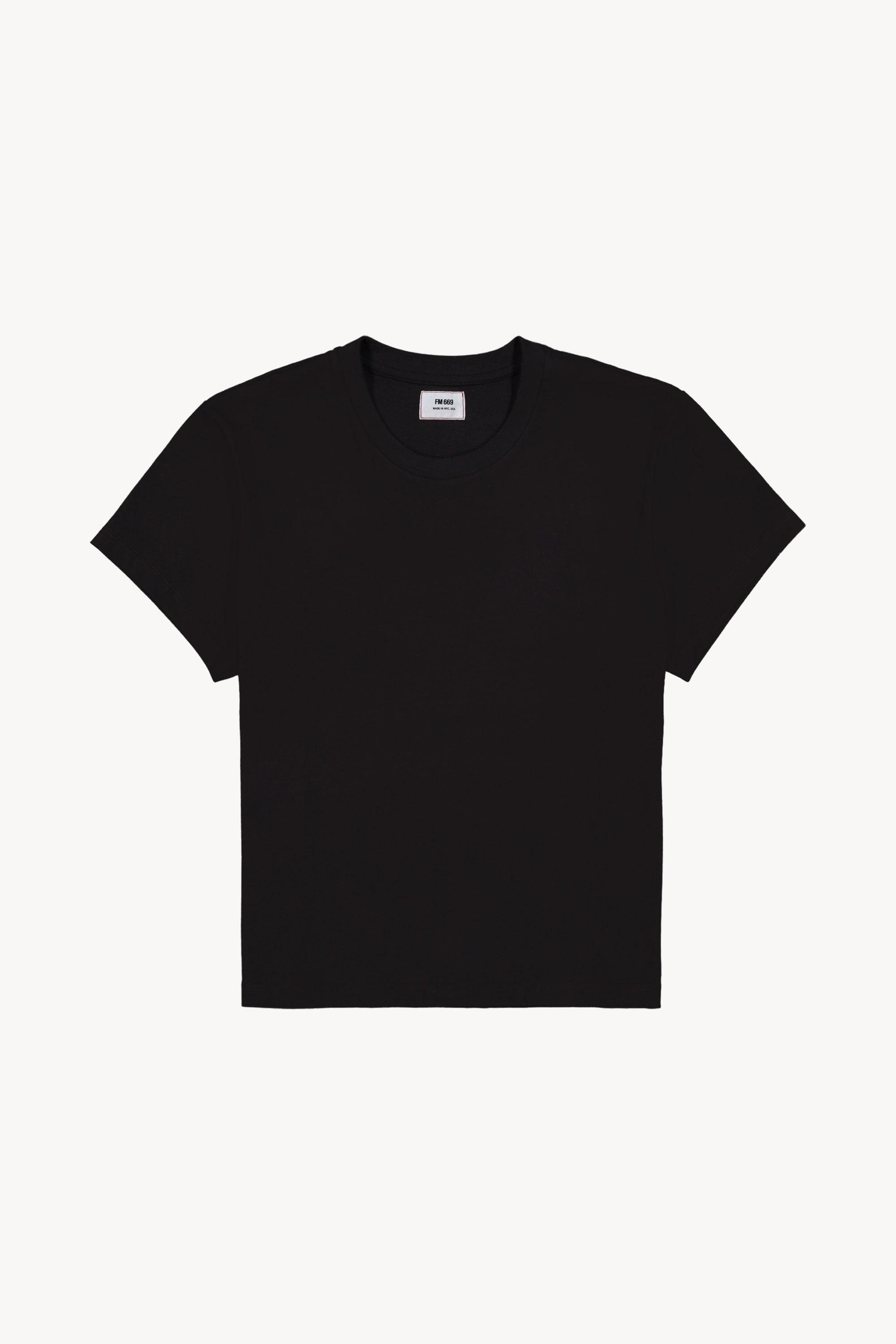 The black little tshirt in a white background. 100% made from organic grown cotton.