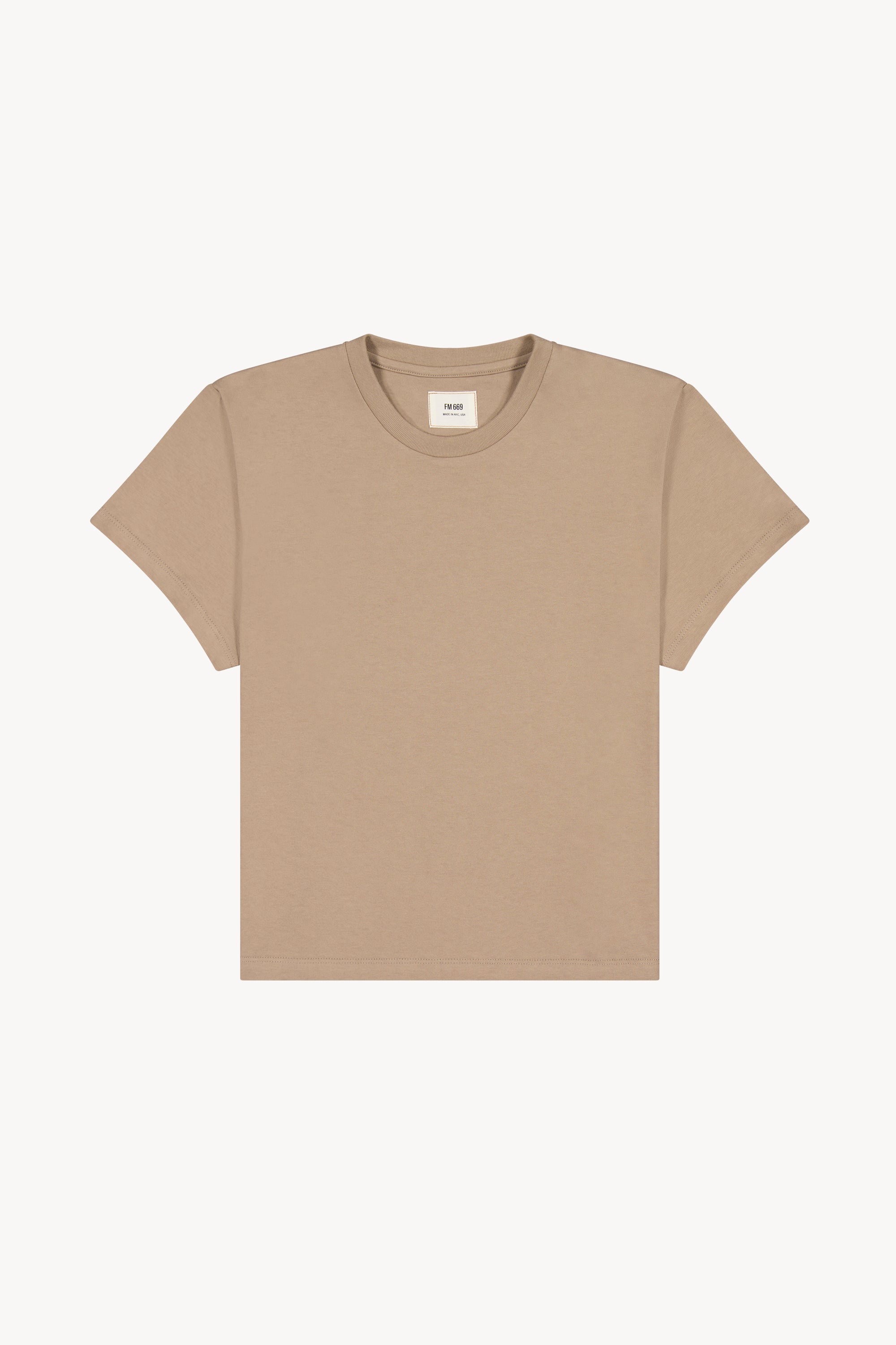 The mid taupe little tshirt in a white background. 100% made from organic grown cotton.
