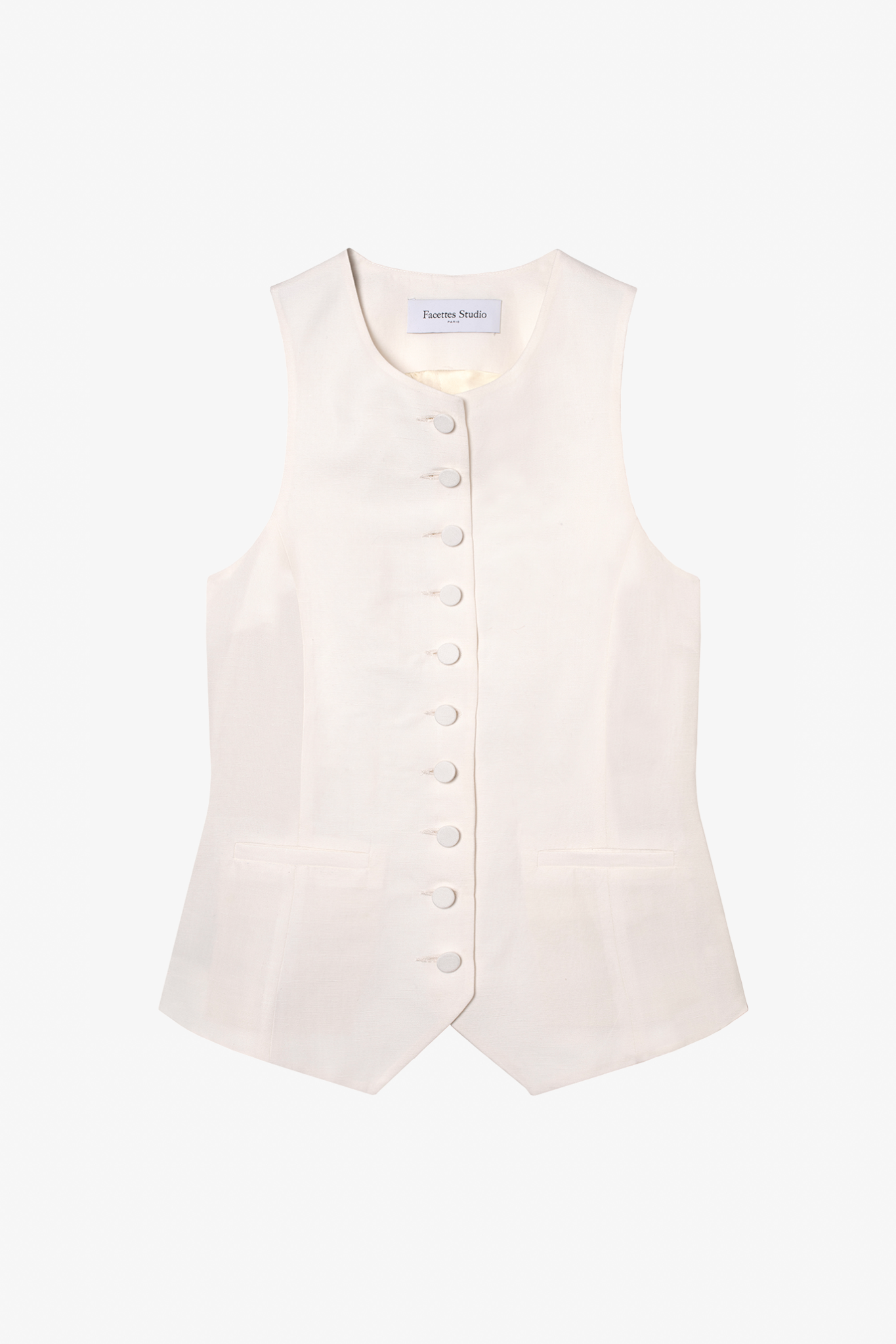The monica off white vest in a white background. 100% upcycled linen and silk mix.