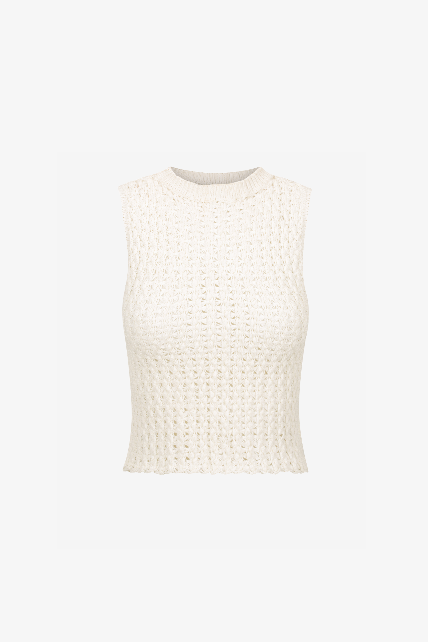 The noa top in a white background. 100% white cotton knit.