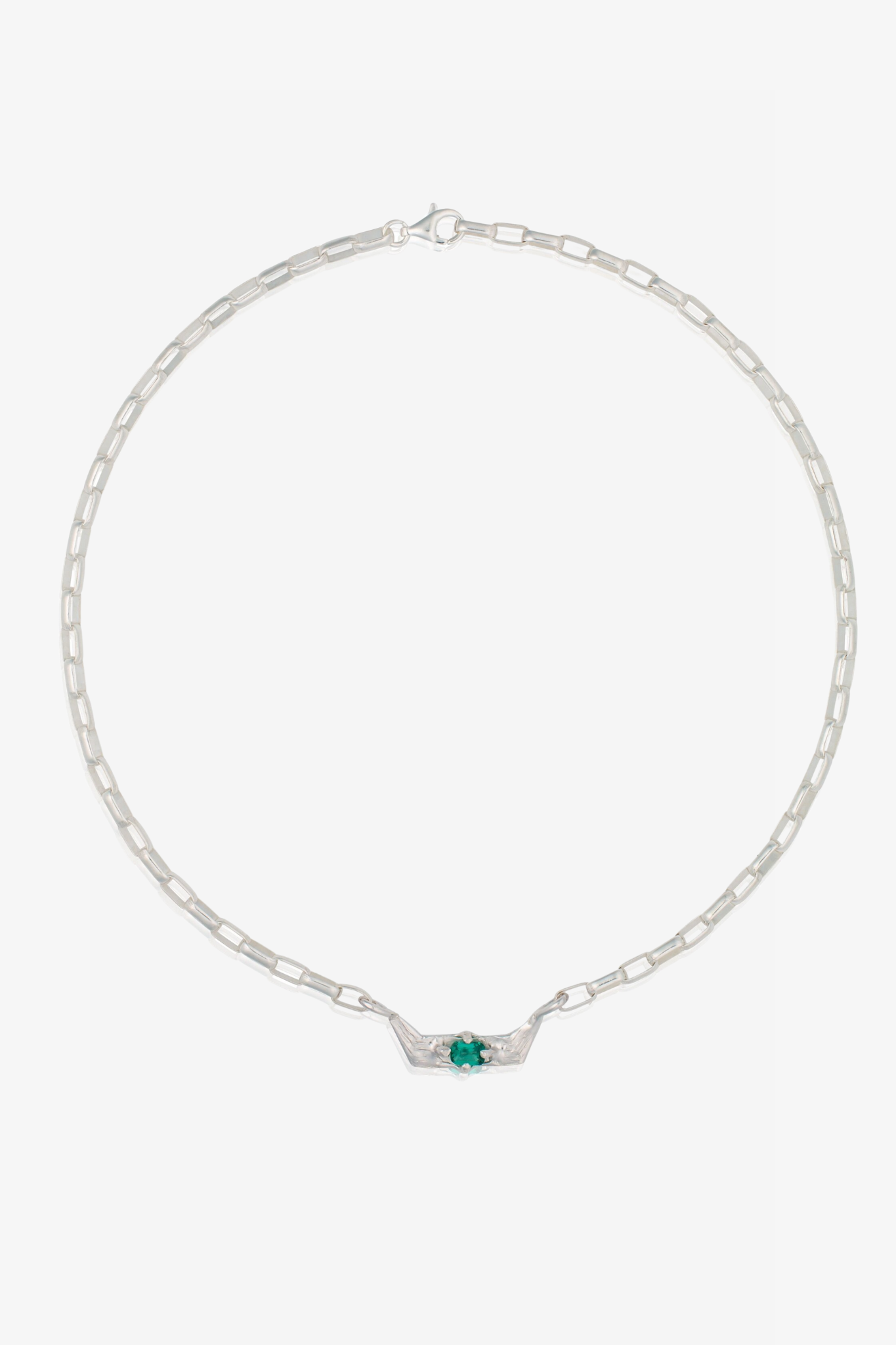 The pixie necklace in a white background. Made from 100% recycled metals and lab created gemstones.