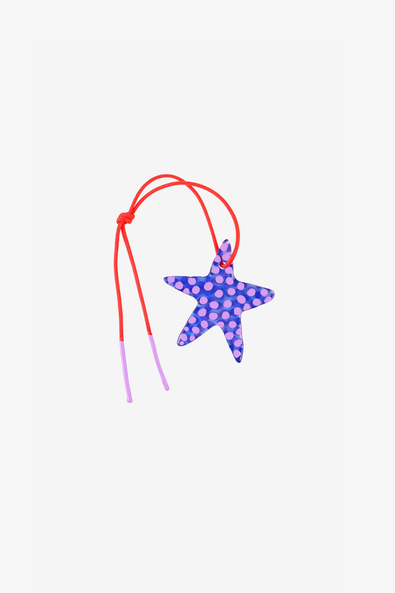 The plum star charm in a white background. Charm are 3D printed and hand finished. Made in New York.