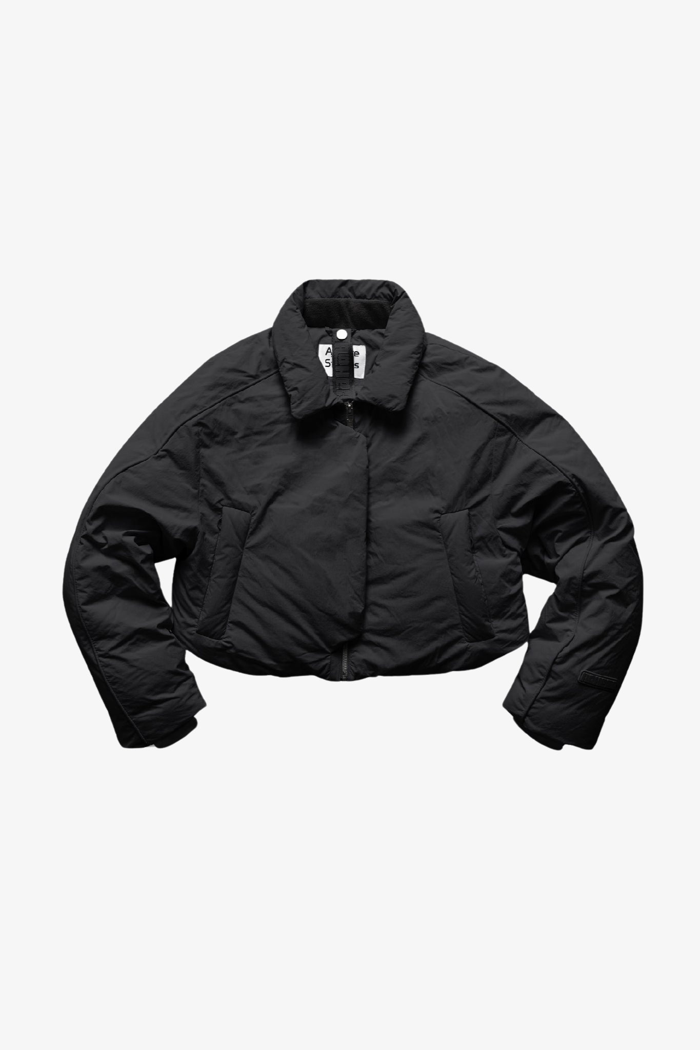 A crop puffer jacket in a white background. 100% made from recycled fabric.