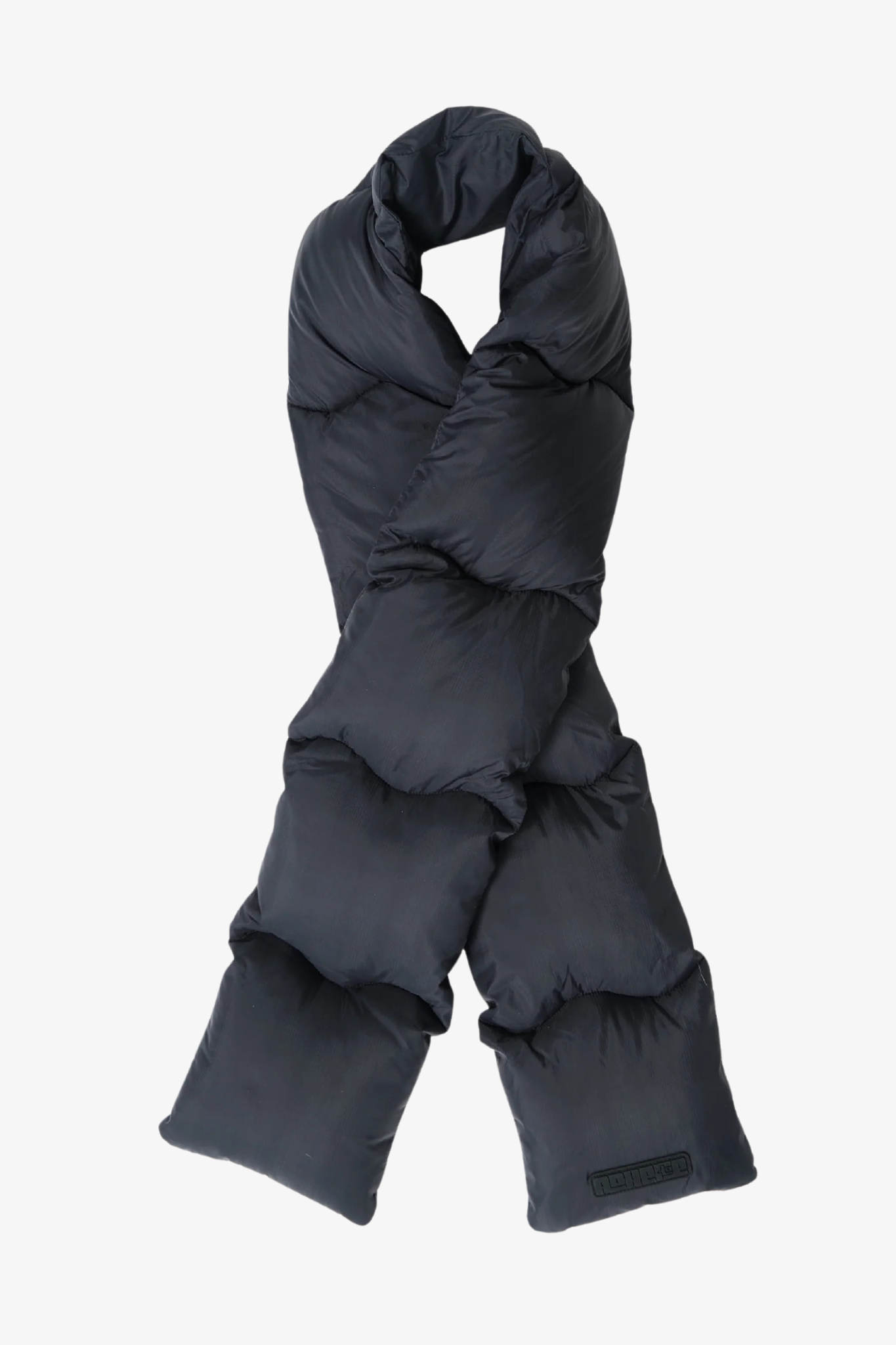 A puffered scarf in a white background. 100% made from recycled fabric.