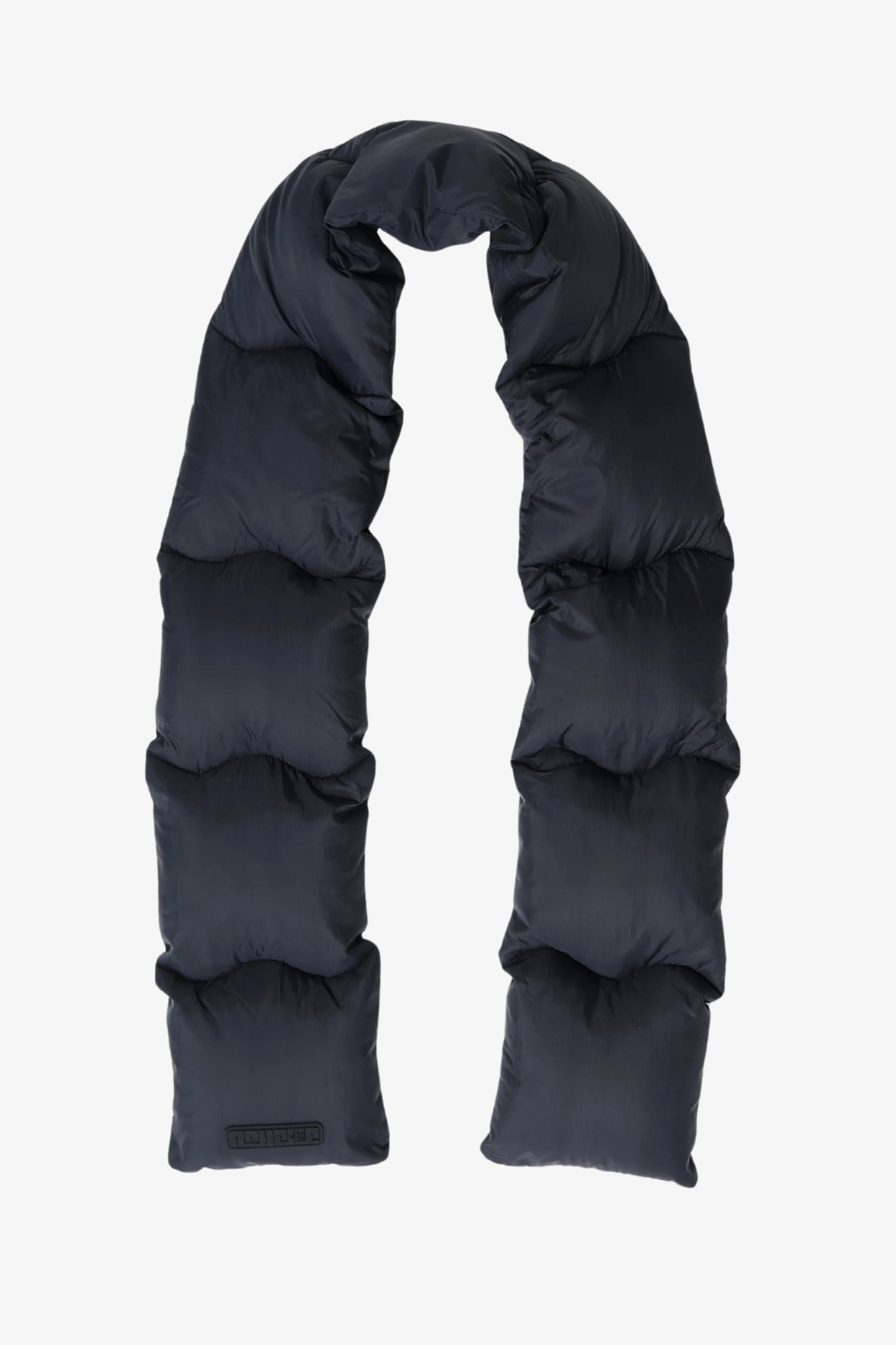 A puffered scarf in a white background. 100% made from recycled fabric.