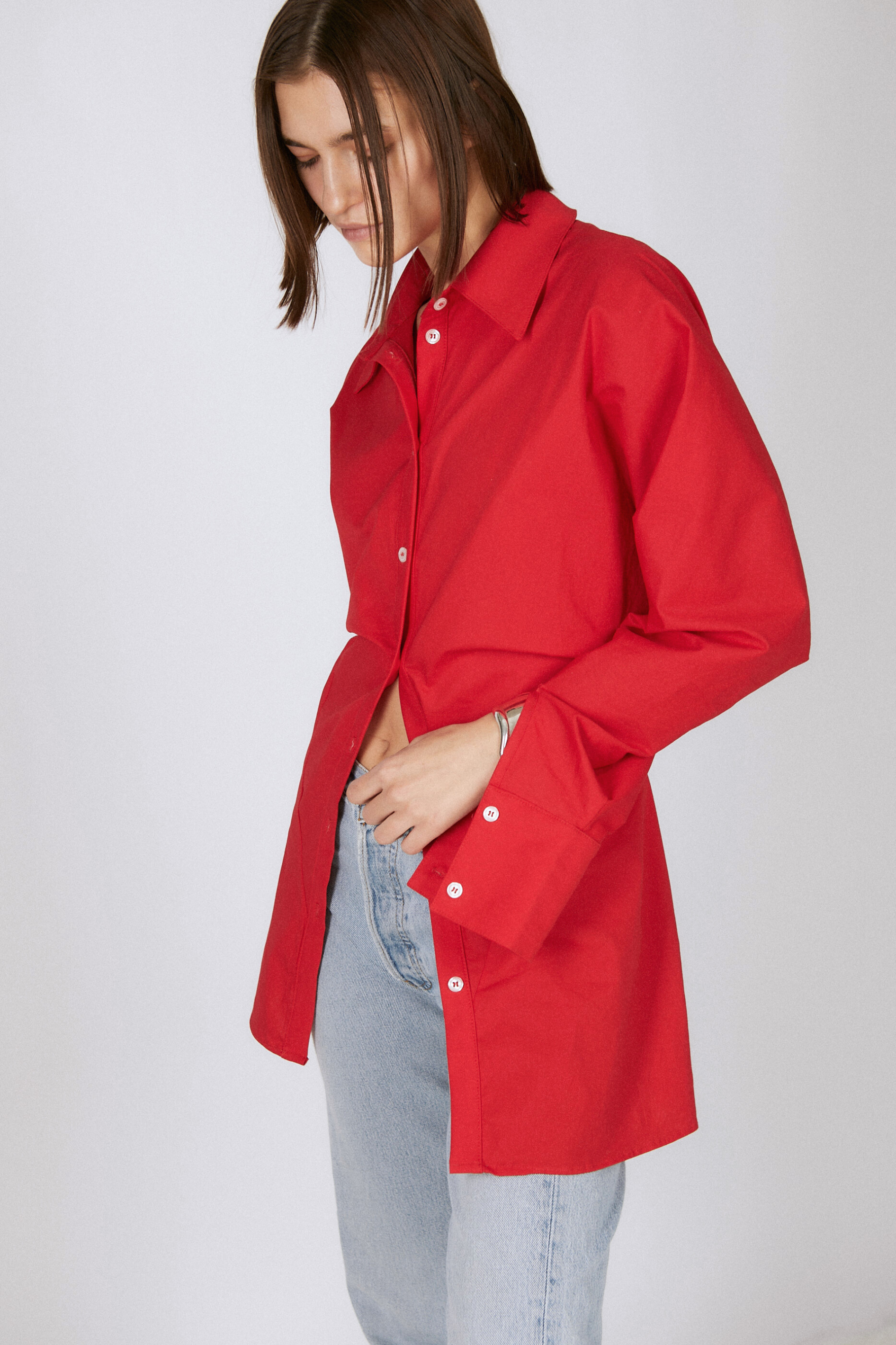 girl wearing faro cinched button up shirt in cherry