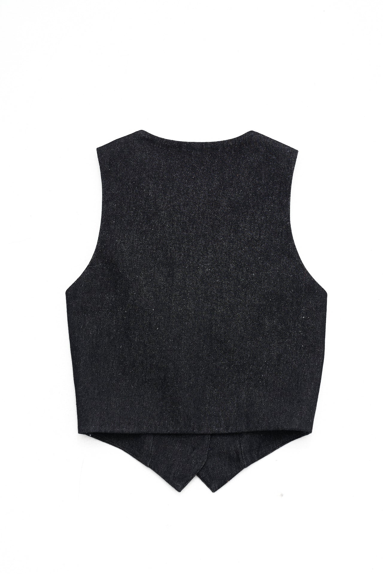 The Renata vest in a white background. 100% made from sustainable materials.