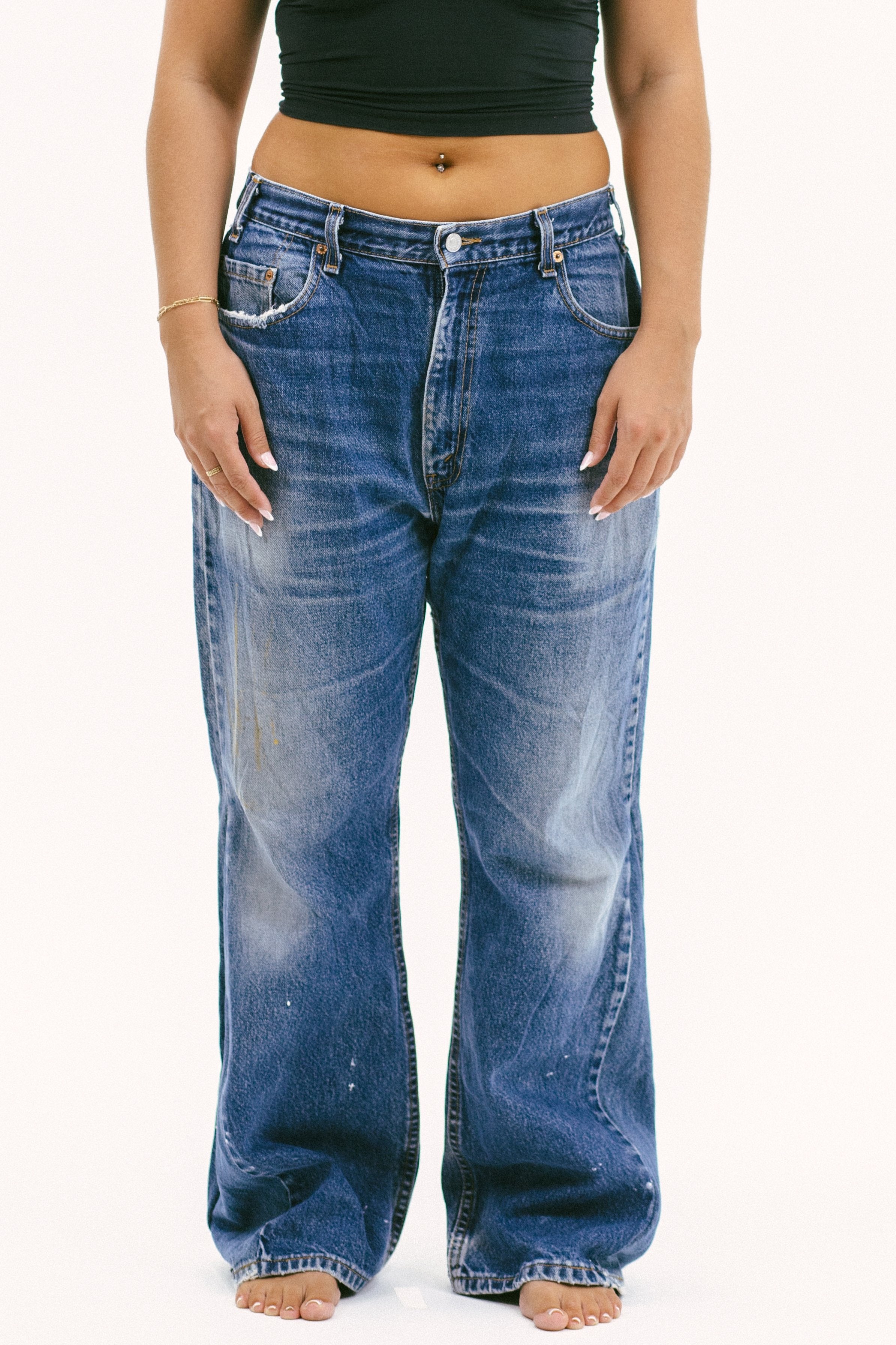 Model wearing the slouchy wide low in a white background. 100% made from sustainable cotton.