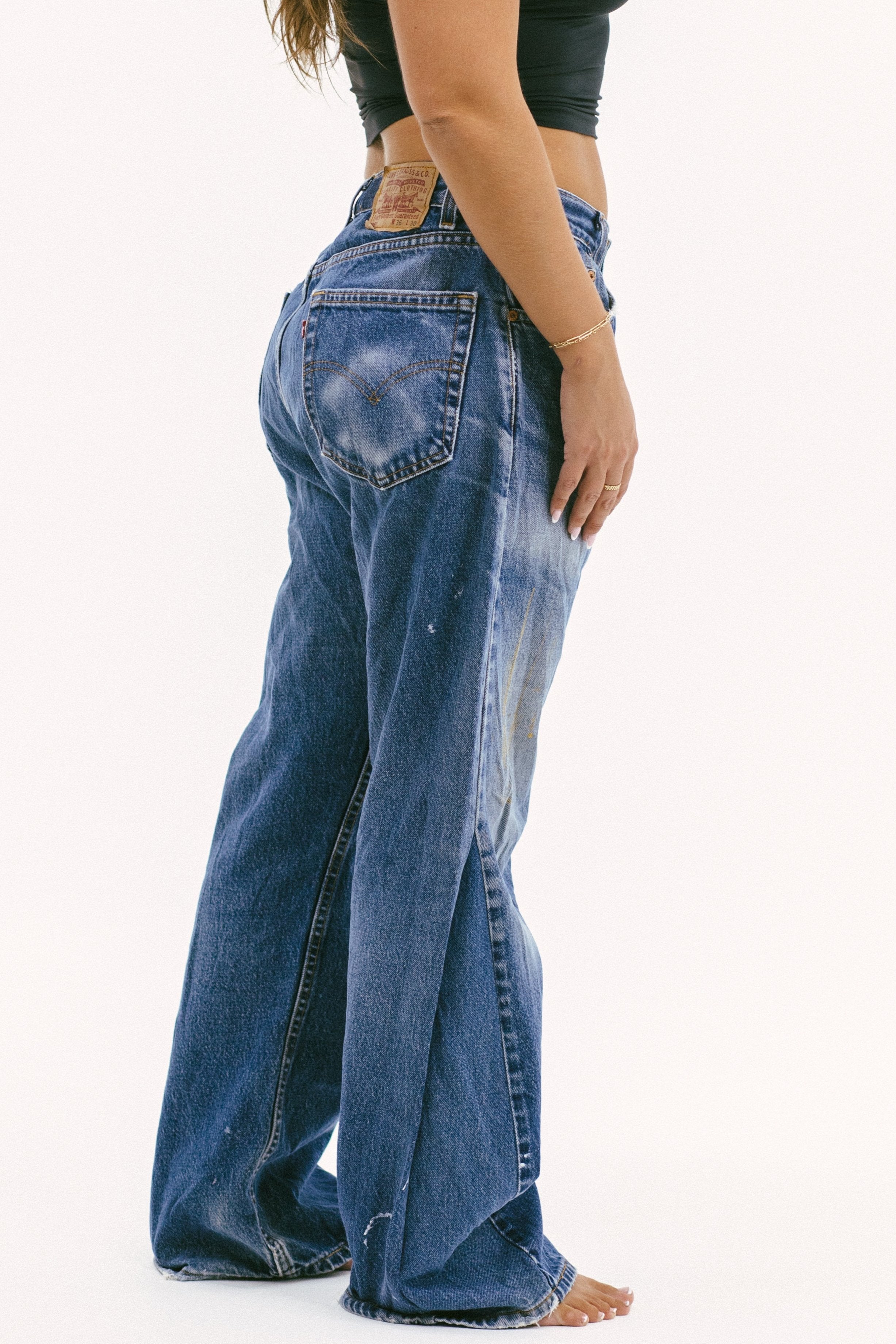 Model wearing the slouchy wide low in a white background. 100% made from sustainable cotton.