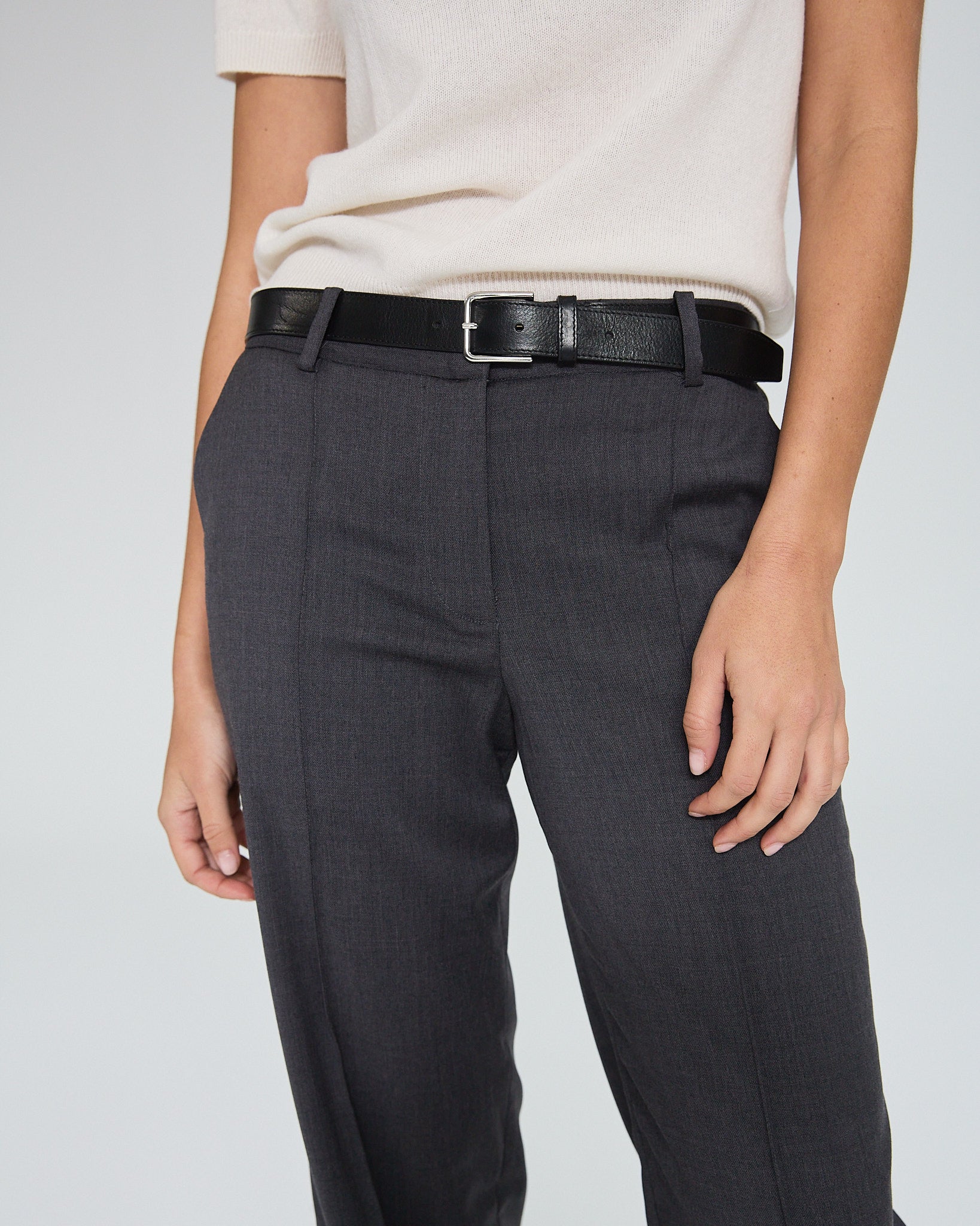 Stevie Slim Trousers in Charcoal in a white background. Made from sustainable deadstock materials.