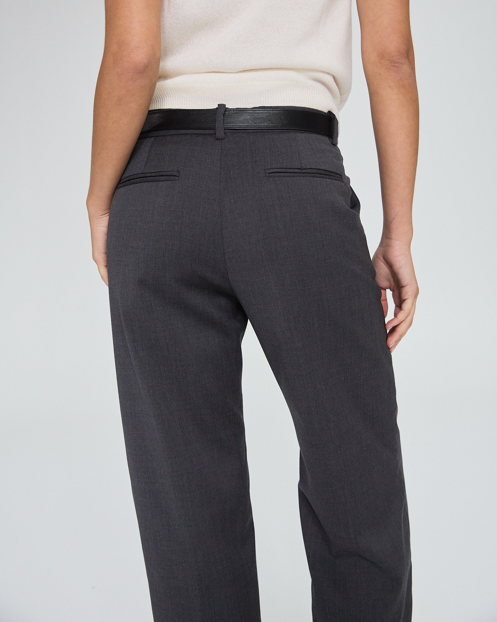Stevie Slim Trousers in Charcoal in a white background. Made from sustainable deadstock materials.