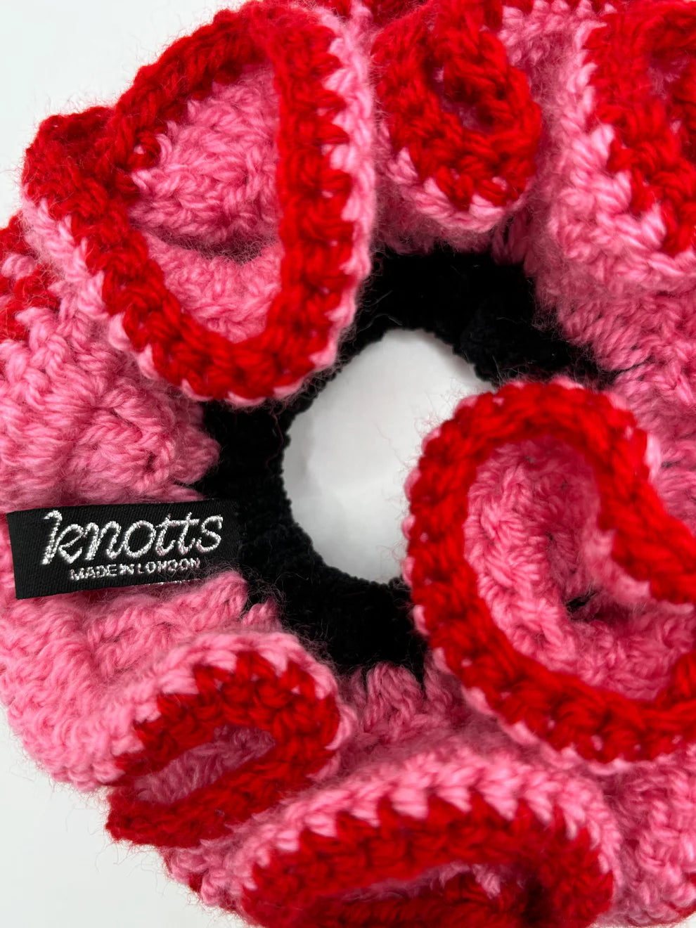 Close-up of the azaryiah scrunchie in a white background. Handmade in London!