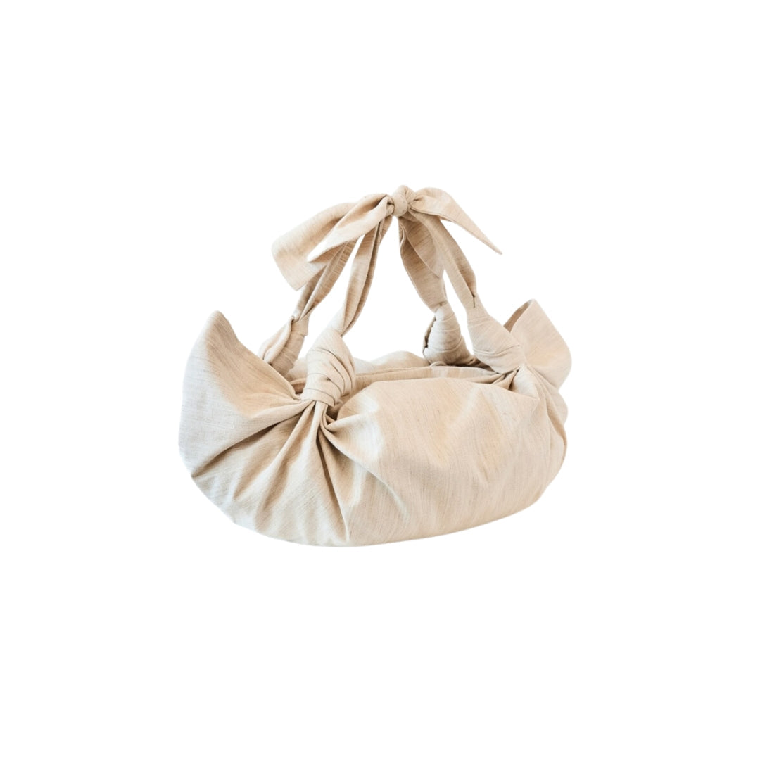 The large linen tote bag in a white background. Deadstock linen fabric sourced in Los Angeles. SIDE VIEW