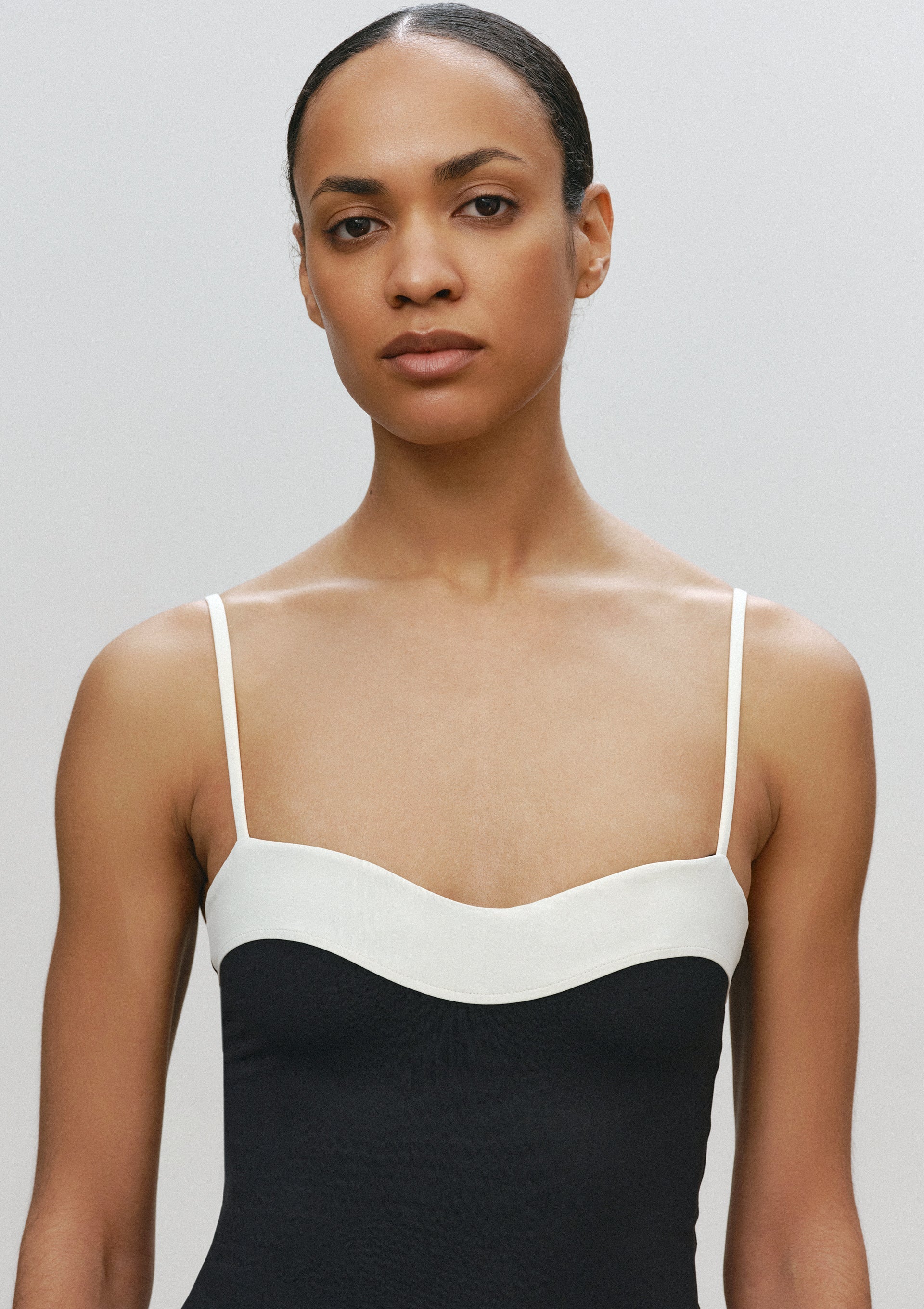 Curve Jumpsuit in Black-Ivory