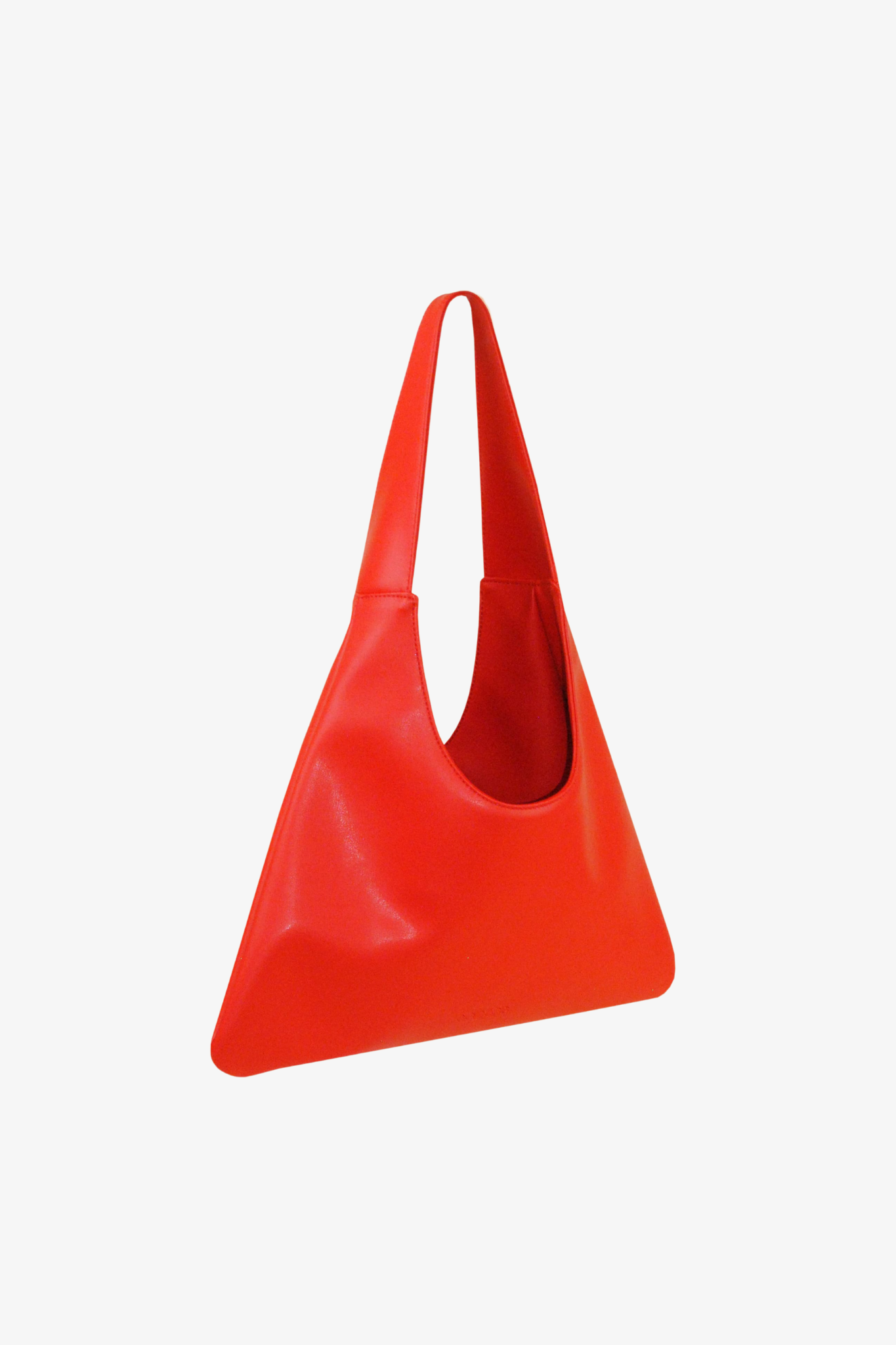 Red sustainable handbag made from cactus leather on a white background. 3/4 View.