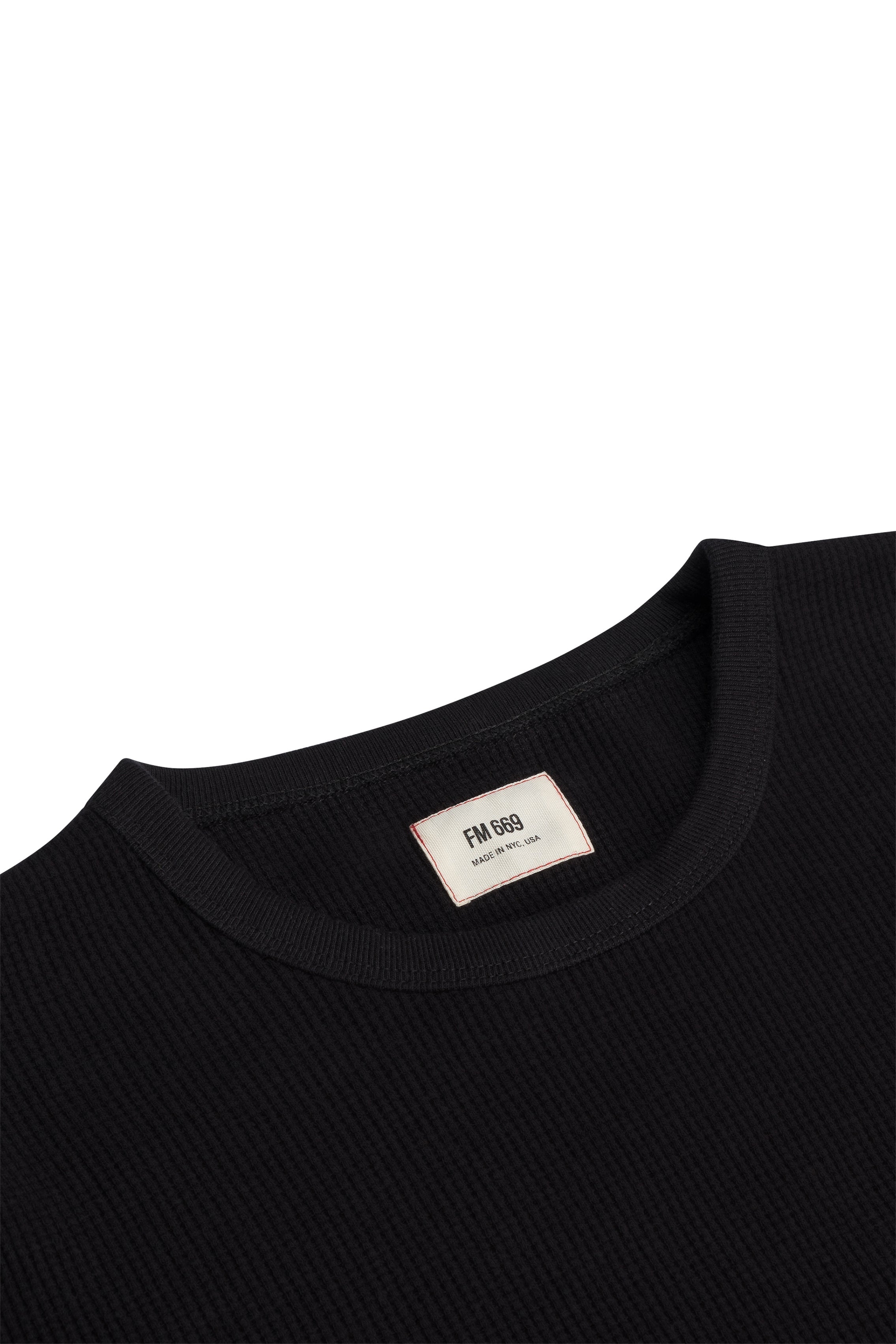 Close-up of the black anthony waffle l/s in a white background. 100% made from organic grown cotton. 