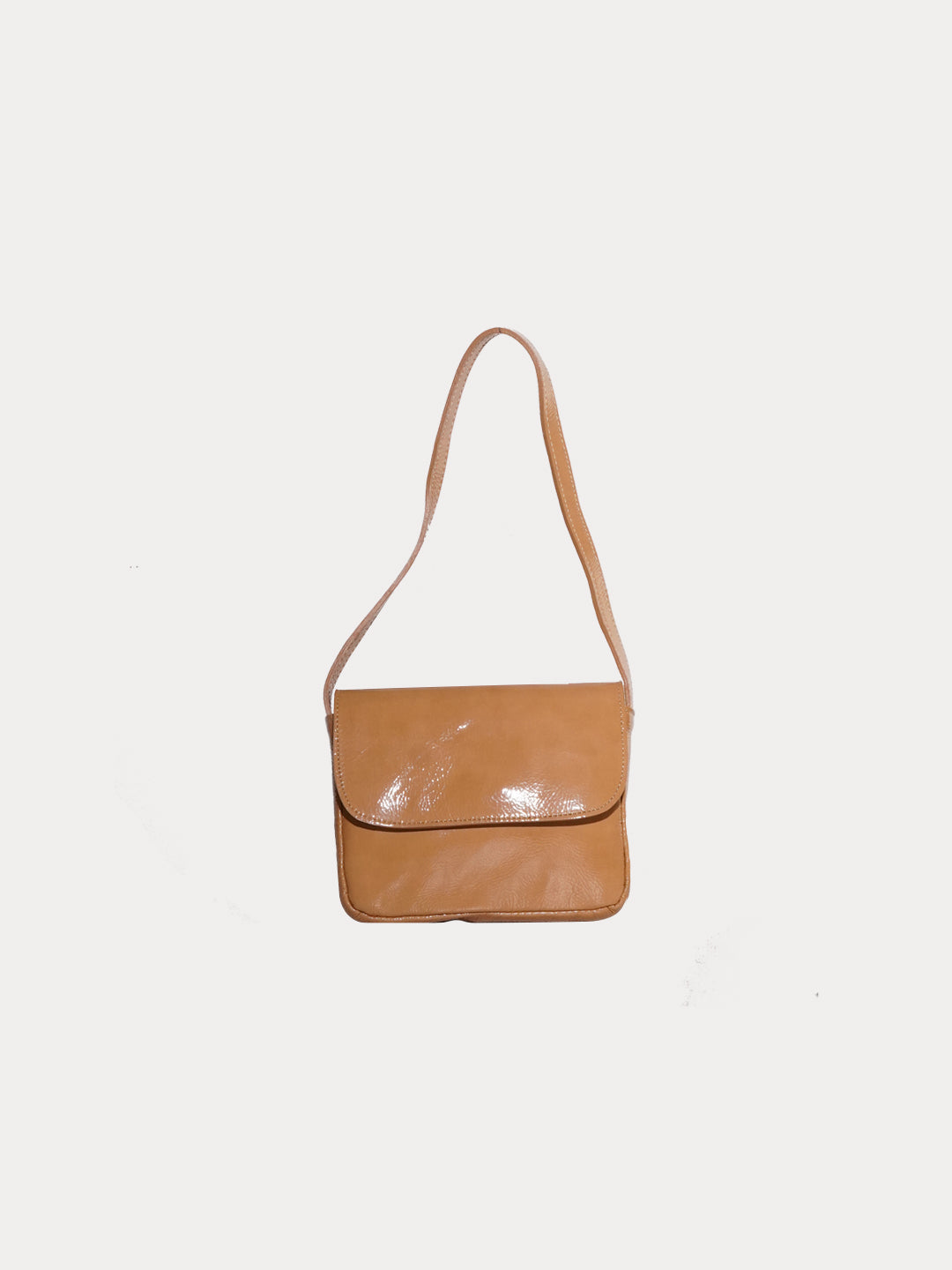 The baby camel bag in a white background. 100% made from deadstock leather. 