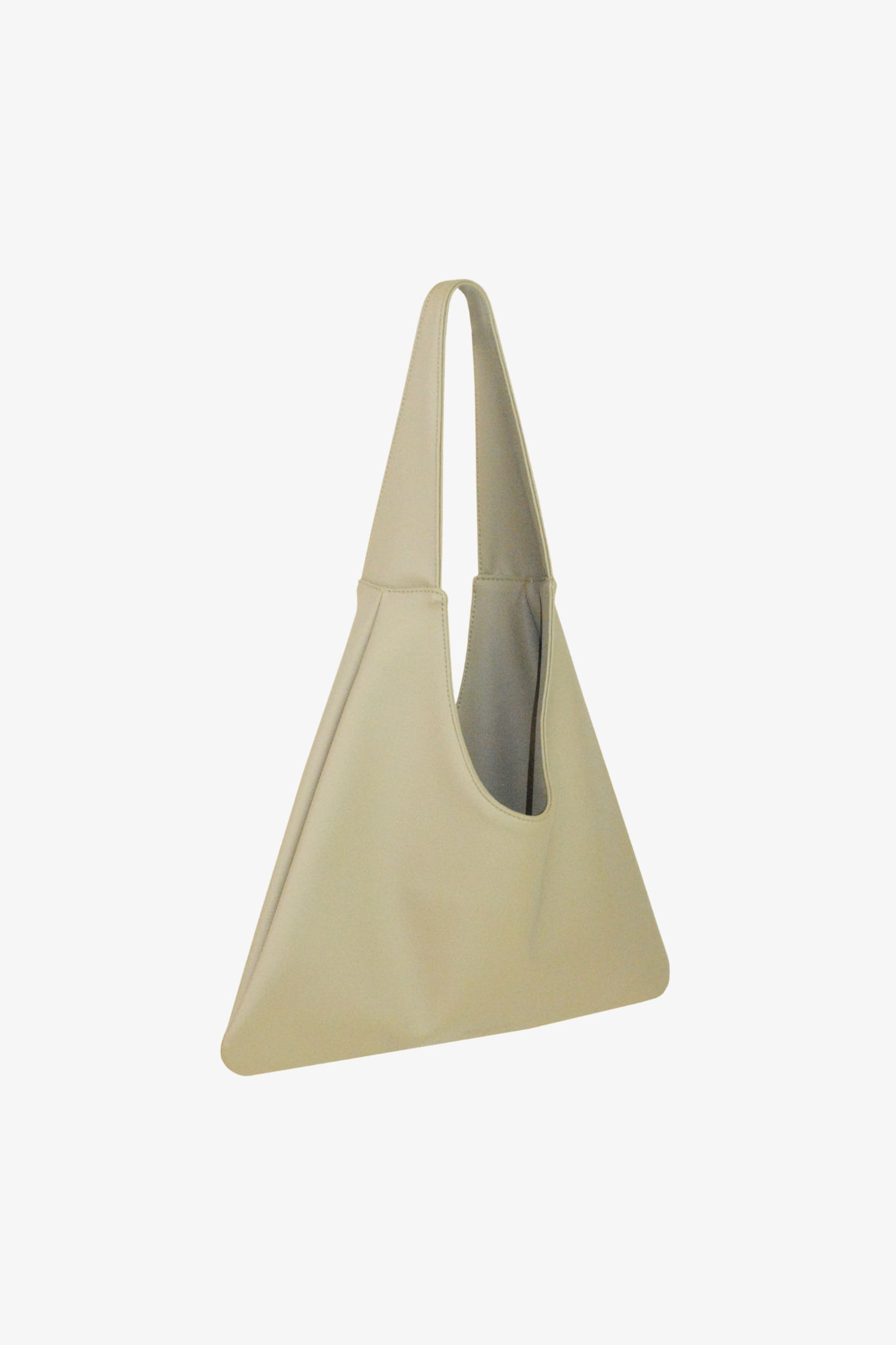 Beige shoulder bag on a light gray background. Made from cactus leather and 100% organic cotton.
