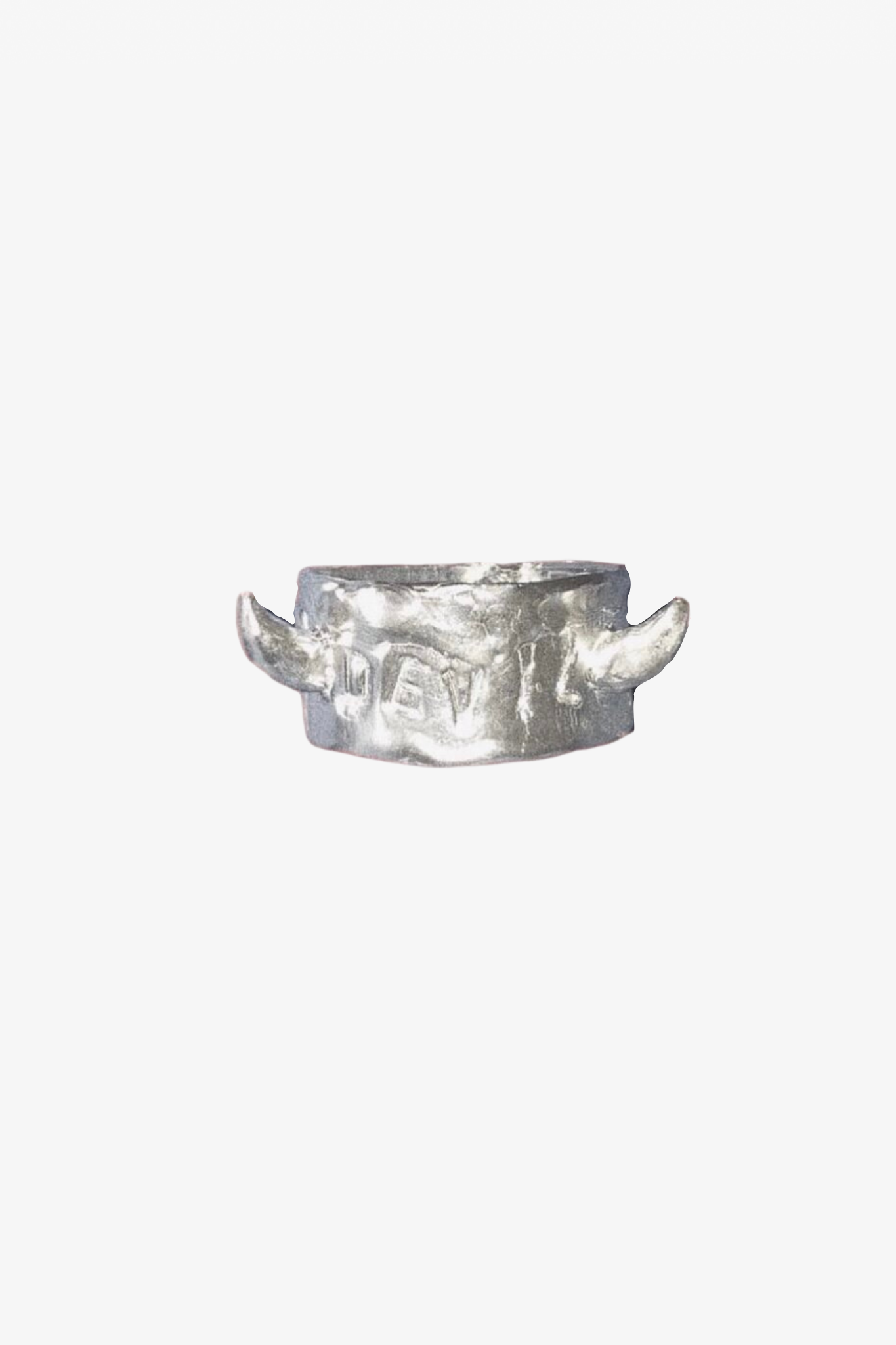 The devil ring in a white background. Made from 100% recycled metals and lab created gemstones
