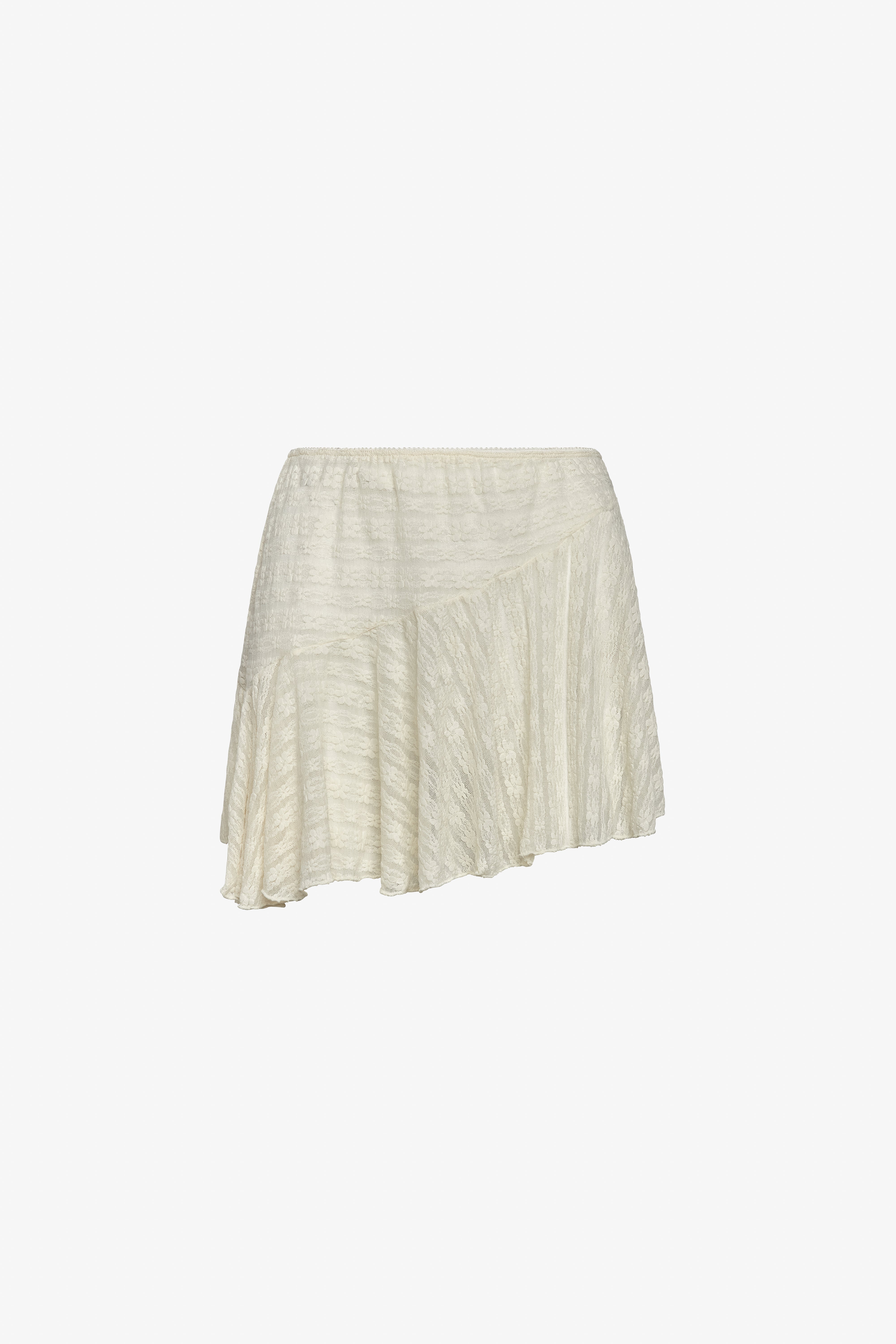 The dreamwave mini skirt in a white background. 100% deadstock lace material. 