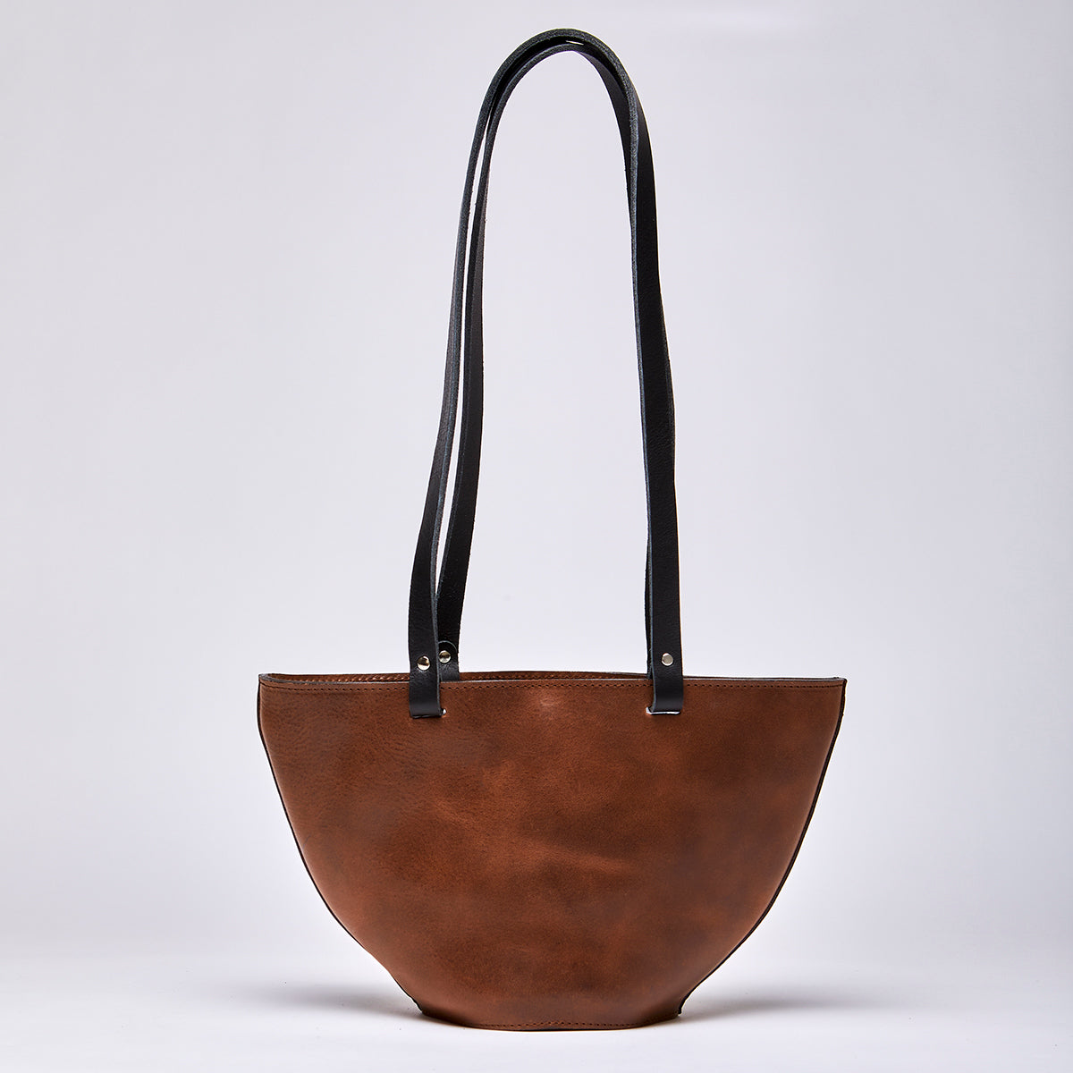 The elwin bag in a white background. Crafted from chrome-free leather.