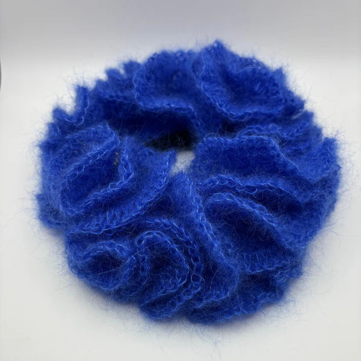 The eva scrunchie in a white background. Handmade in London!