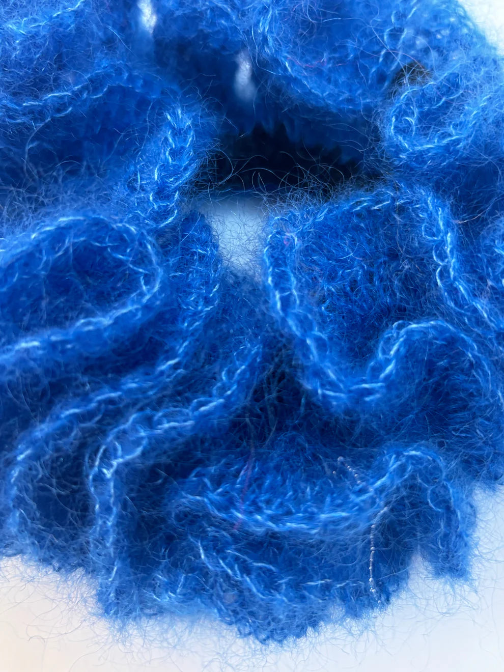 The eva scrunchie in a white background. Handmade in London!