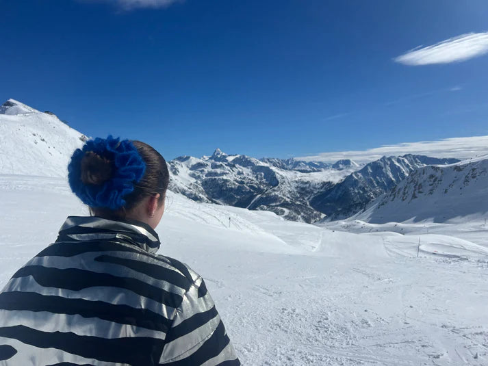 A model wearing the eva scrunchie in a snowy background. Handmade in London!