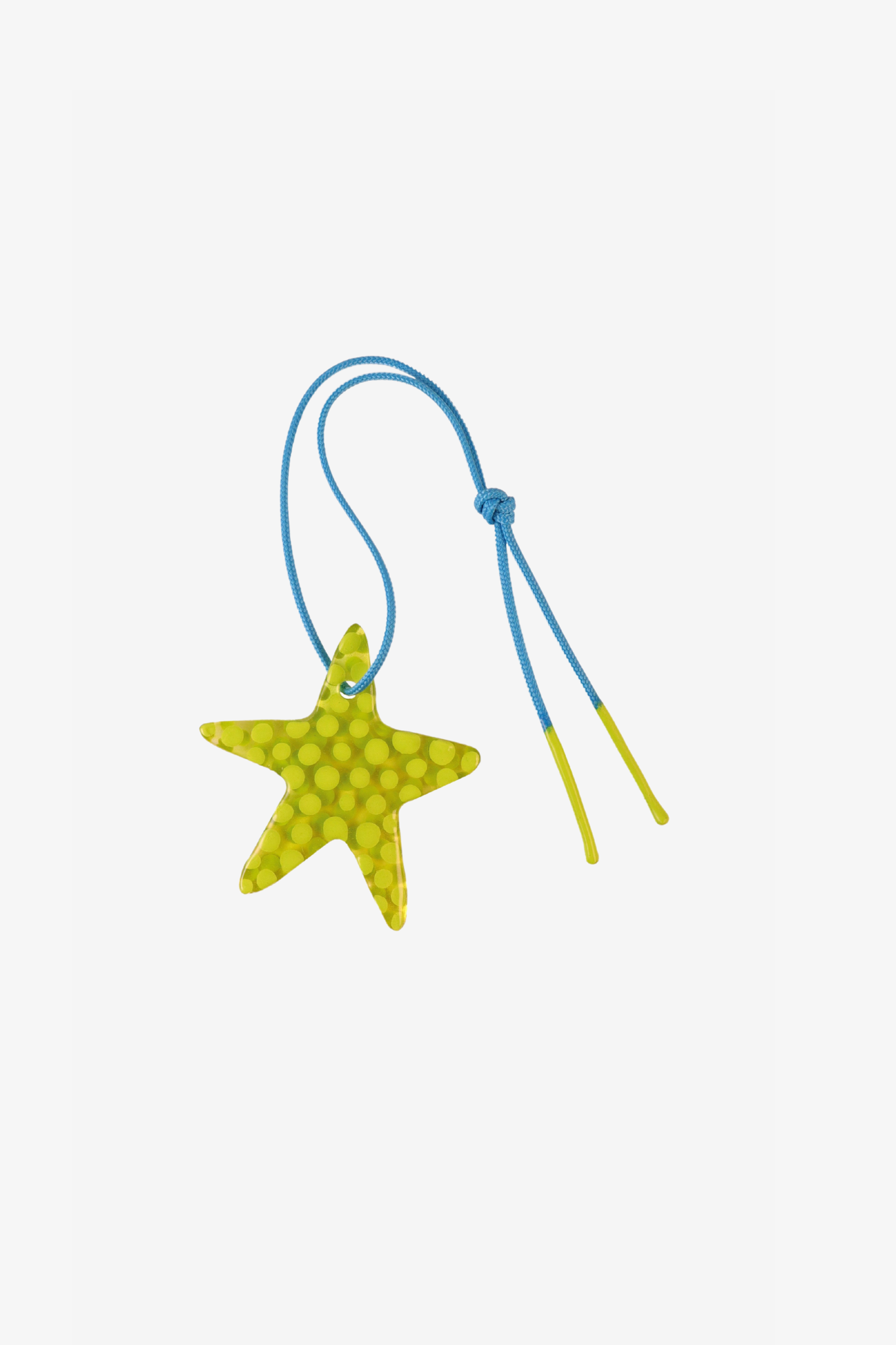 The lime star charm in a white background. Charm are 3D printed and hand finished. Made in New York