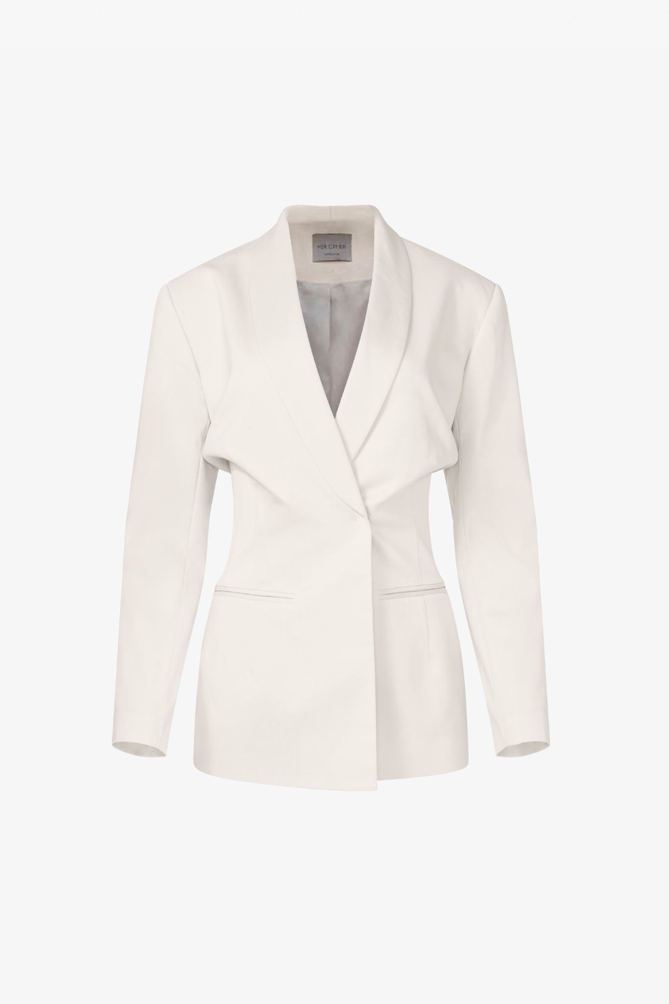 The matisse blazer in brazillian sand in a white background. 100% made from organic cotton.