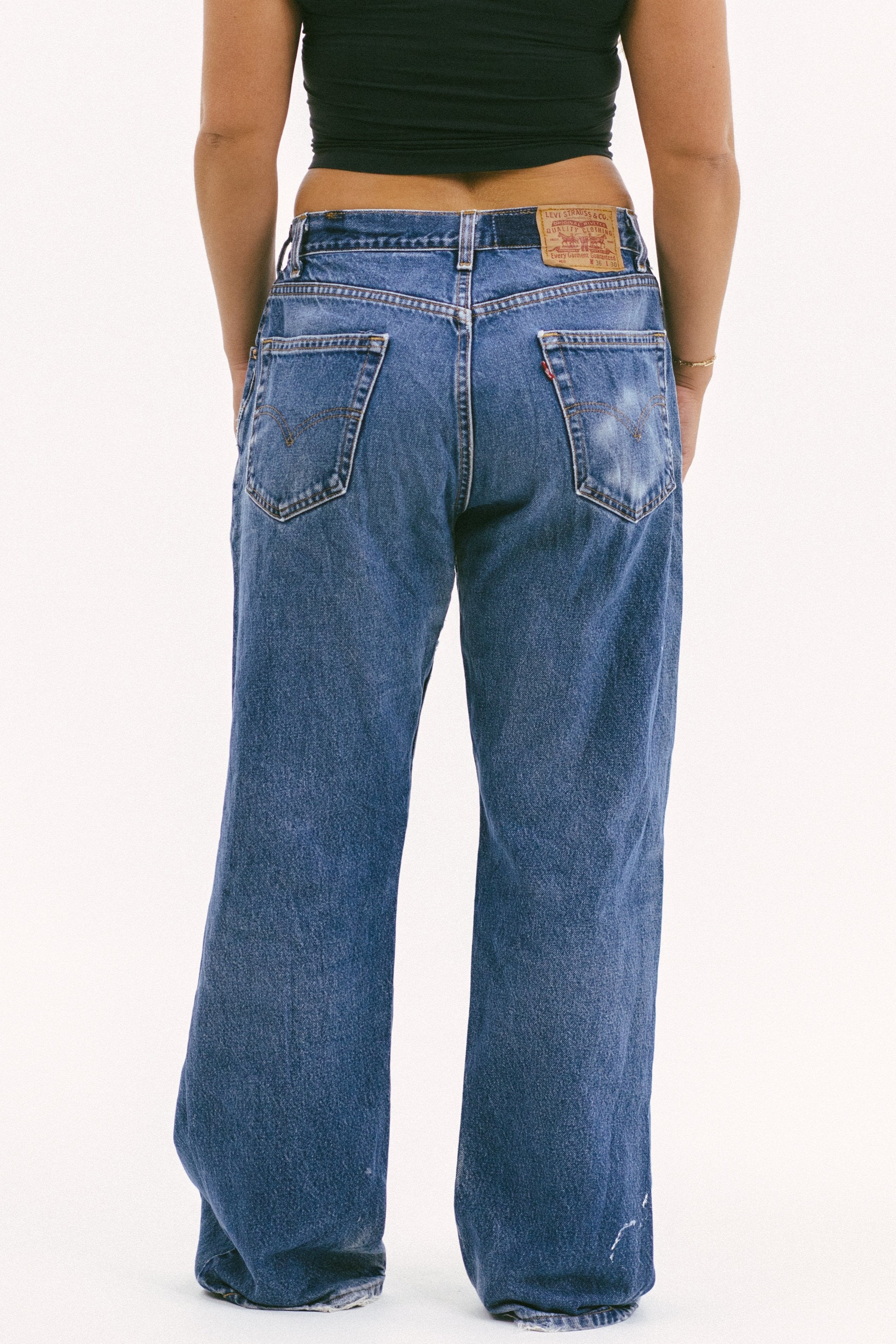 Model wearing the slouchy wide low in a white background. 100% made from sustainable cotton. 