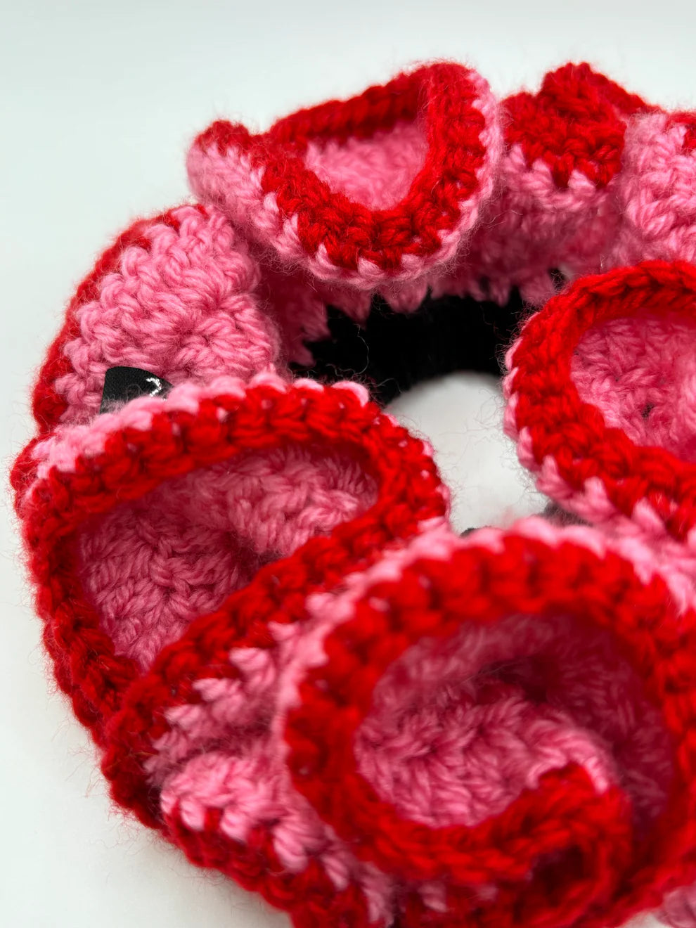 Close-up of the azaryiah scrunchie in a white background. Handmade in London!