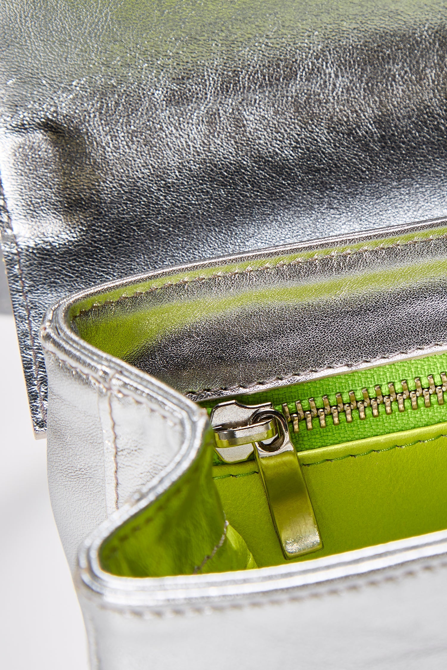 Close-up of the babe silver bag in a white background. 100% made from deadstock leather.