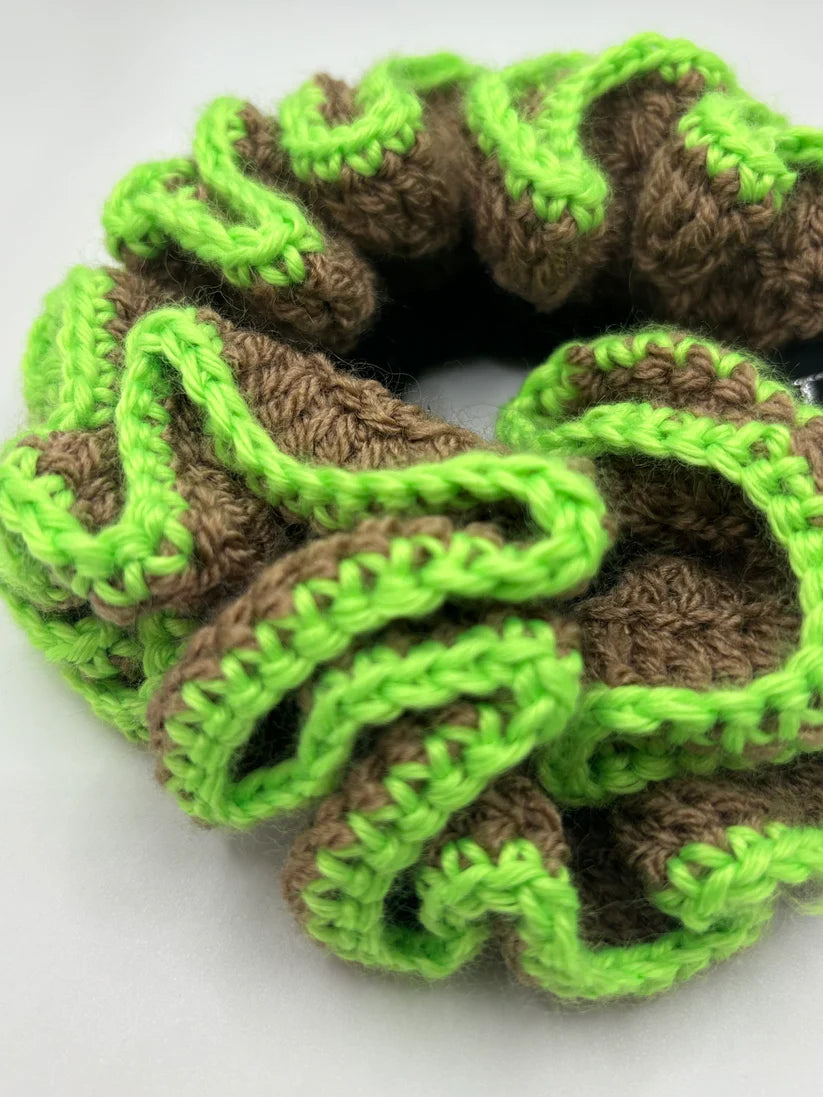 The bella scrunchie in a white background. Handmade in London!